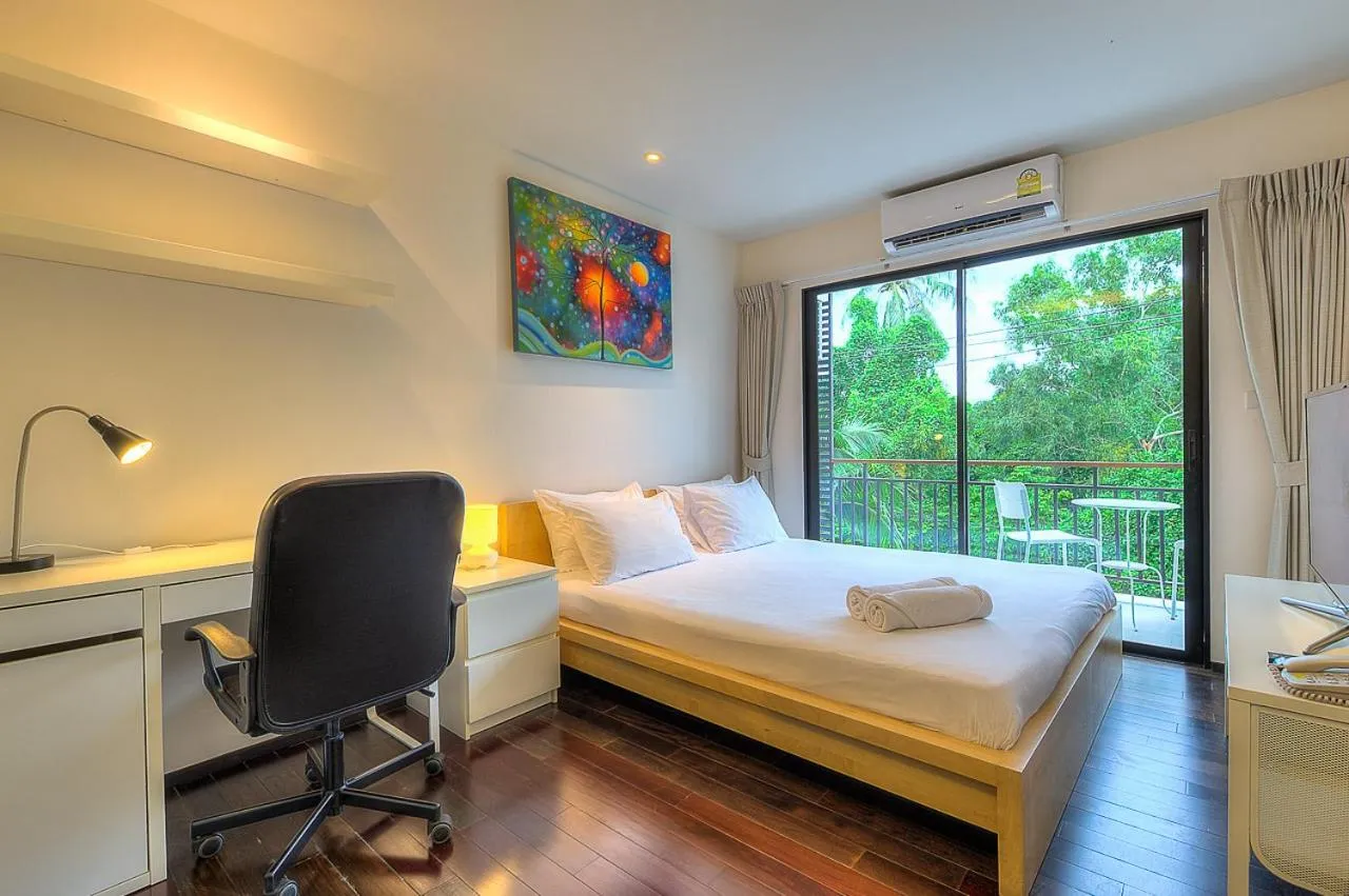 Photo of the whole room, Bed in The Title Comfort Condotel