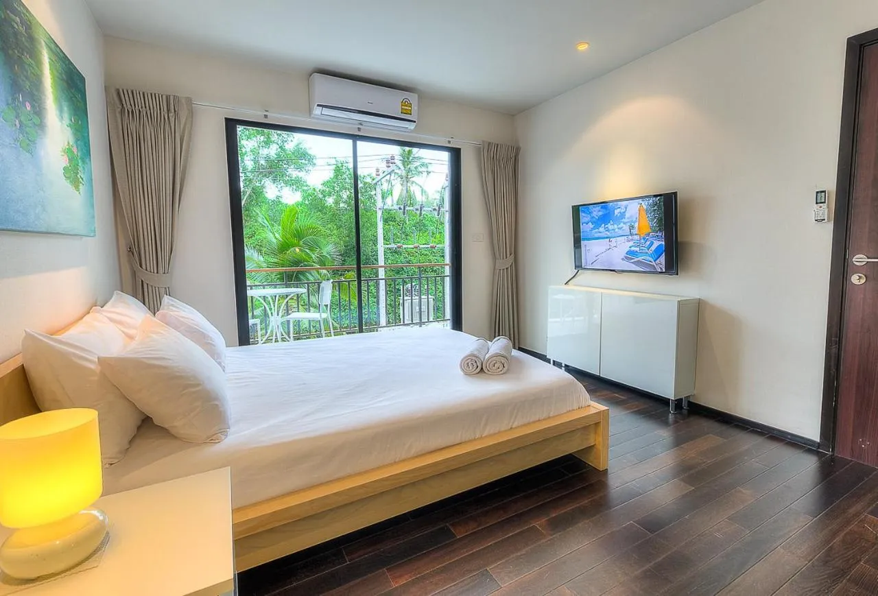 Photo of the whole room, Bed in The Title Comfort Condotel