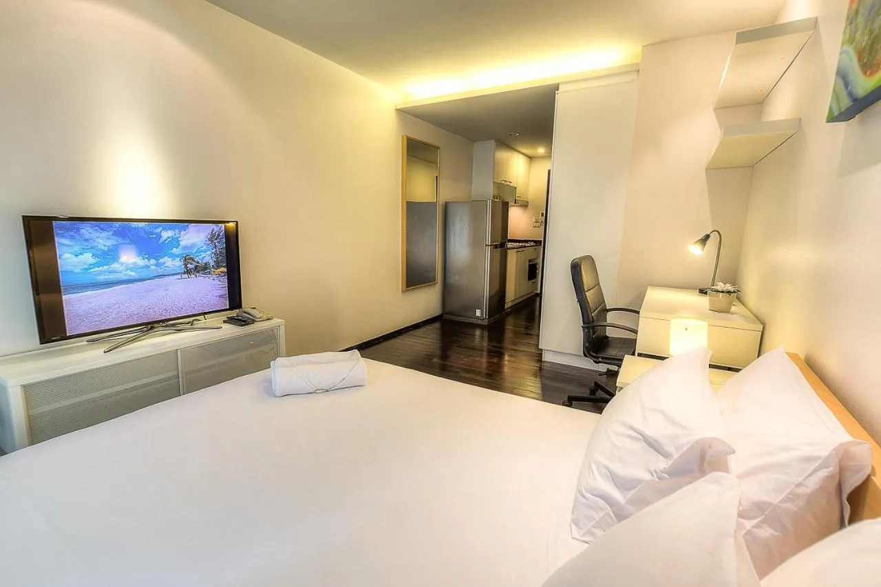 Photo of the whole room, Bed in The Title Comfort Condotel