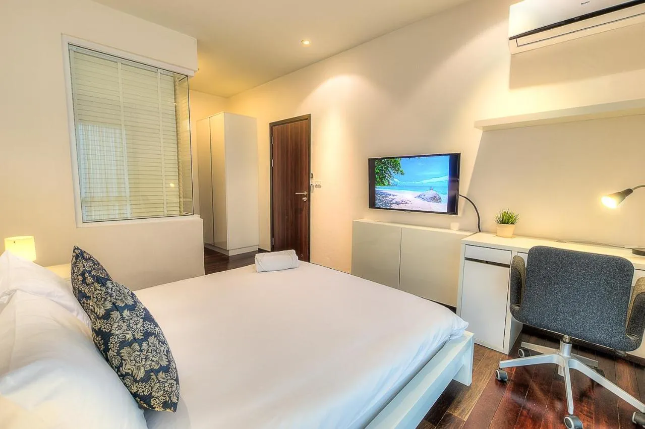 Photo of the whole room, Bed in The Title Comfort Condotel