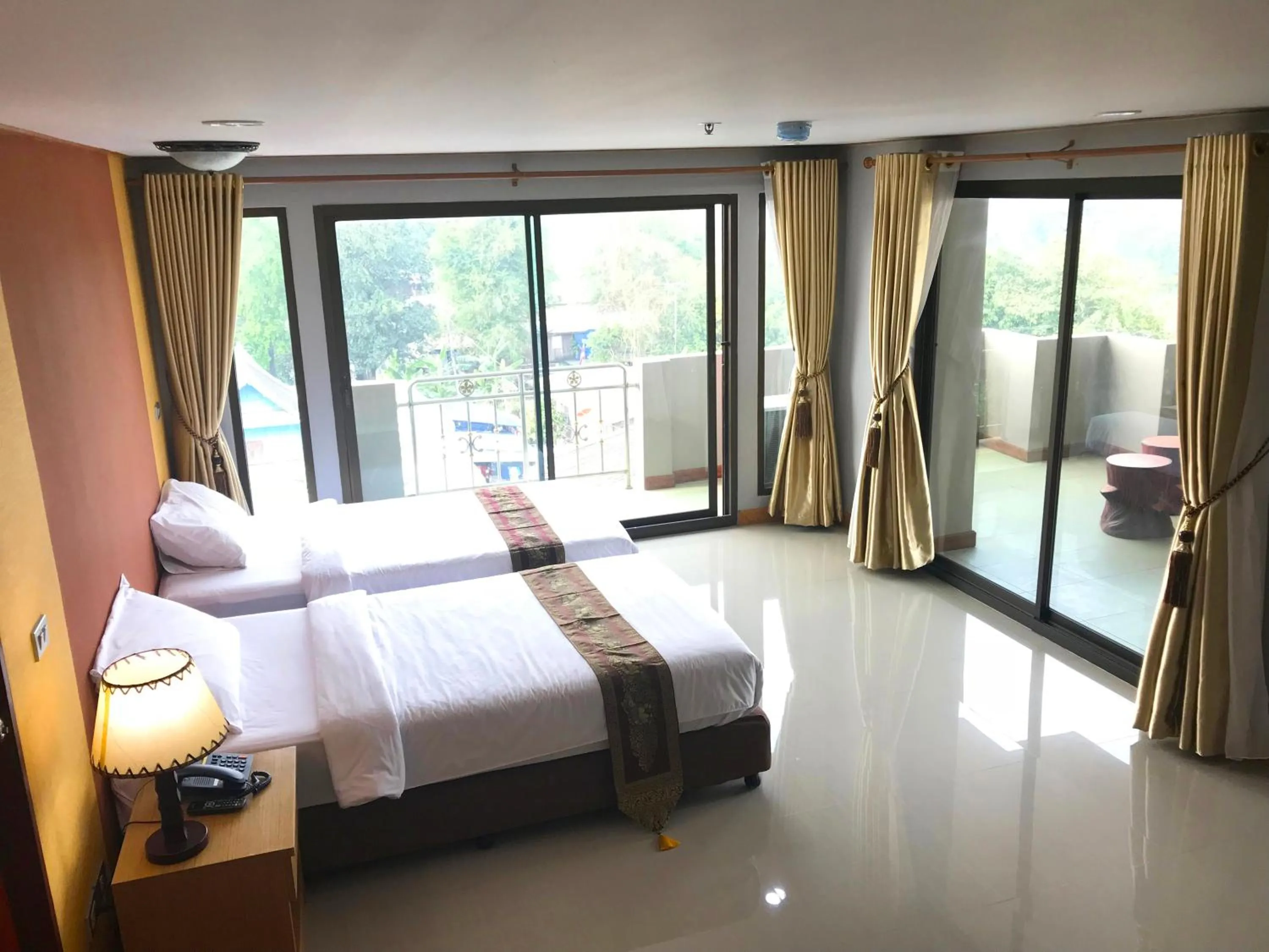 Bed in Toh Buk Seng Ayutthaya Hotel