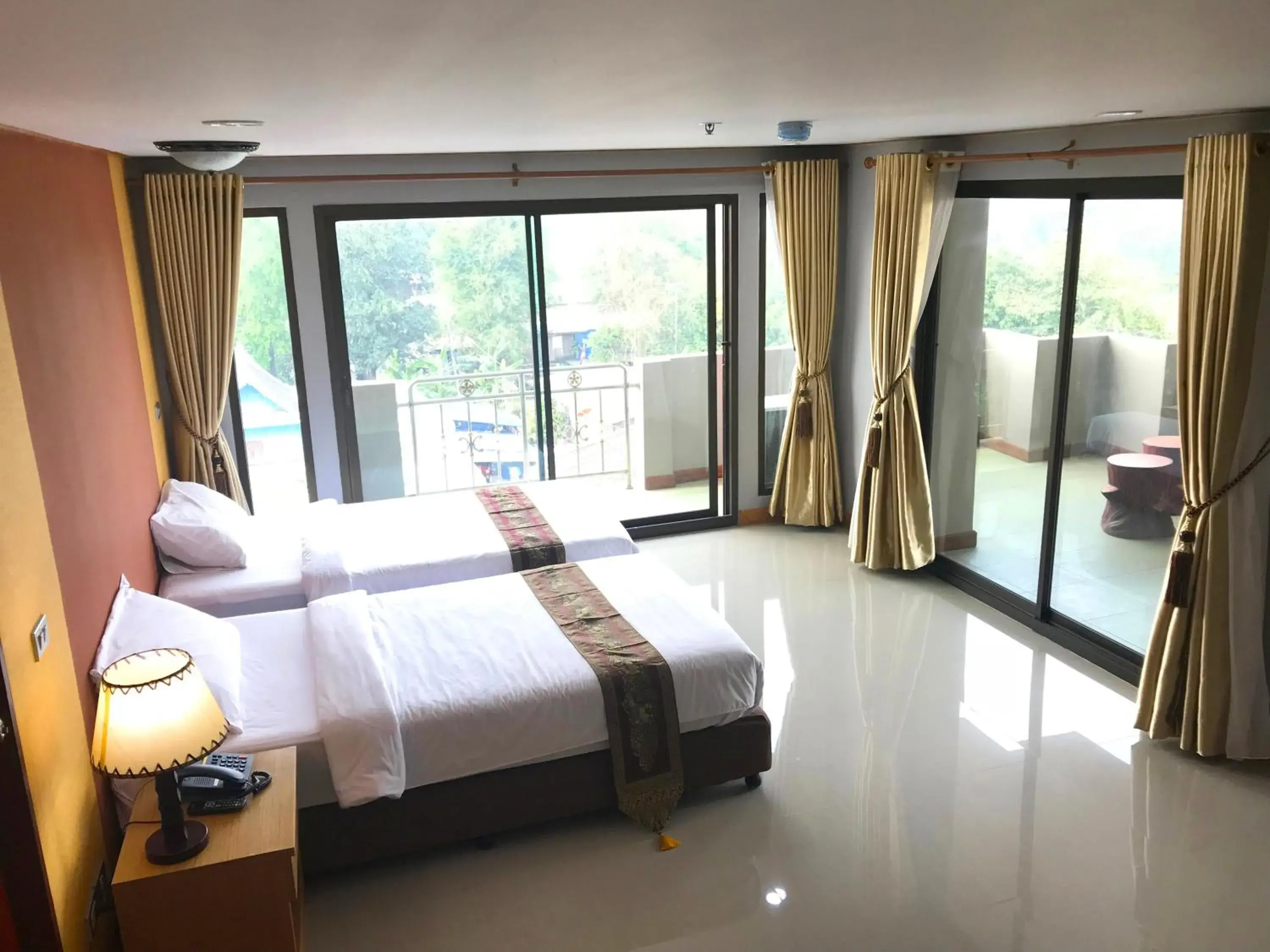 Bed in Toh Buk Seng Ayutthaya Hotel Bed in Toh Buk Seng Ayutthaya Hotel