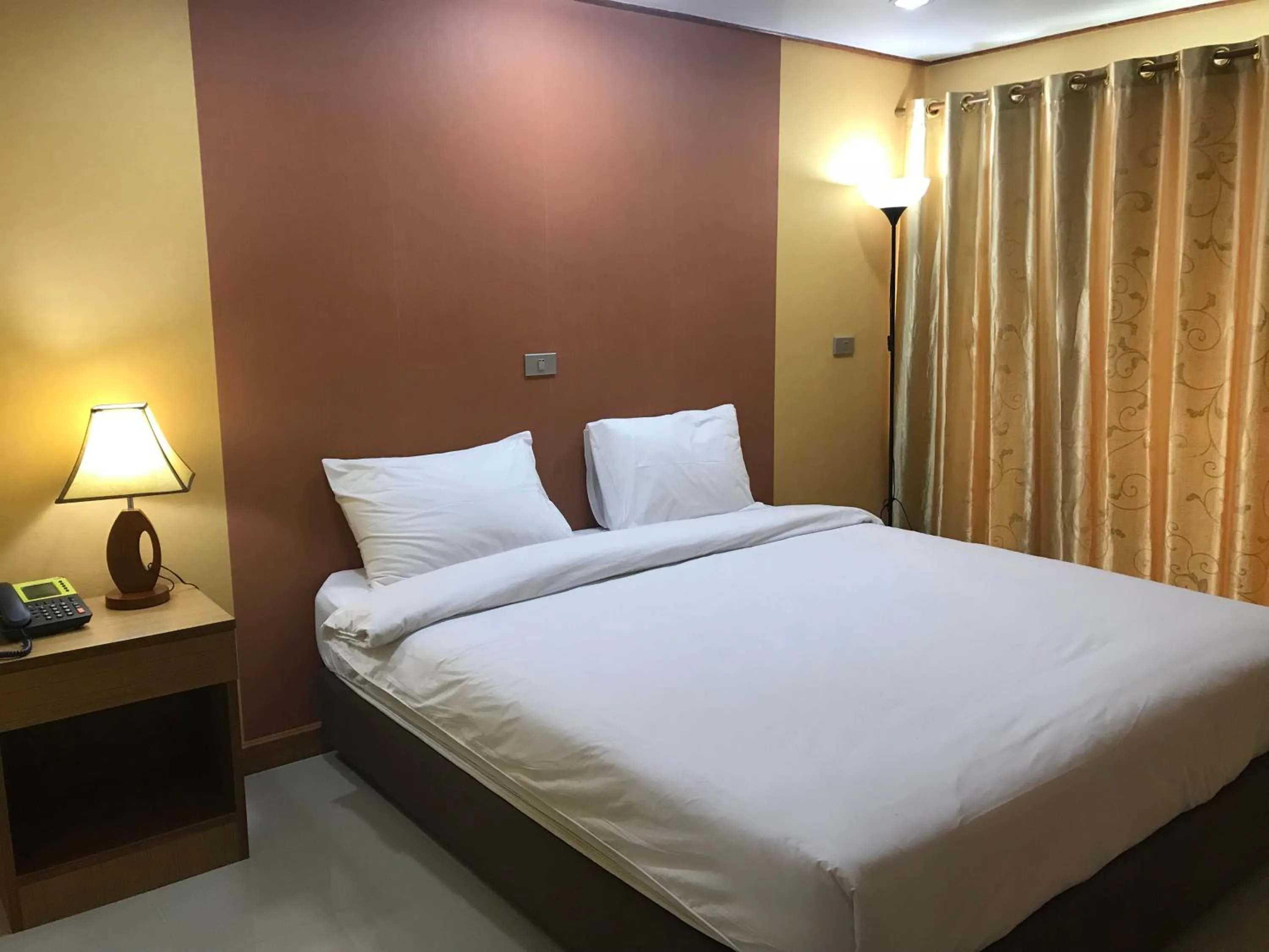 Bed in Toh Buk Seng Ayutthaya Hotel