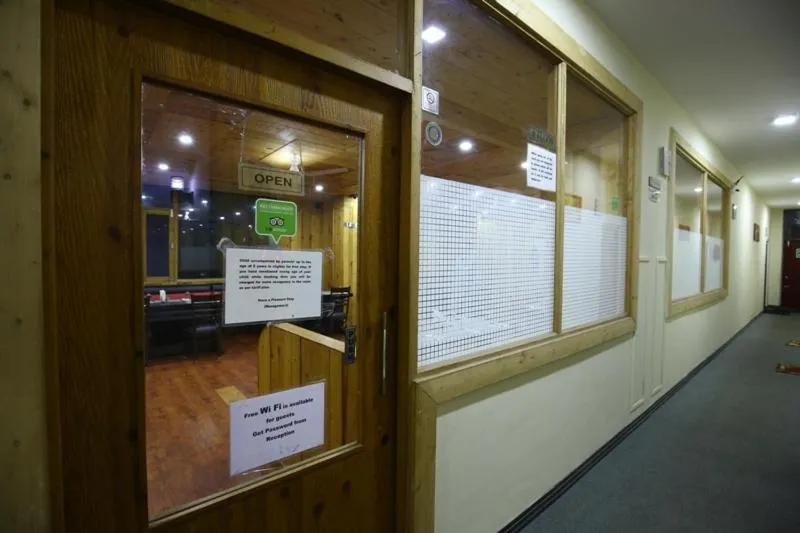 Property logo or sign in Hotels Apple Nest