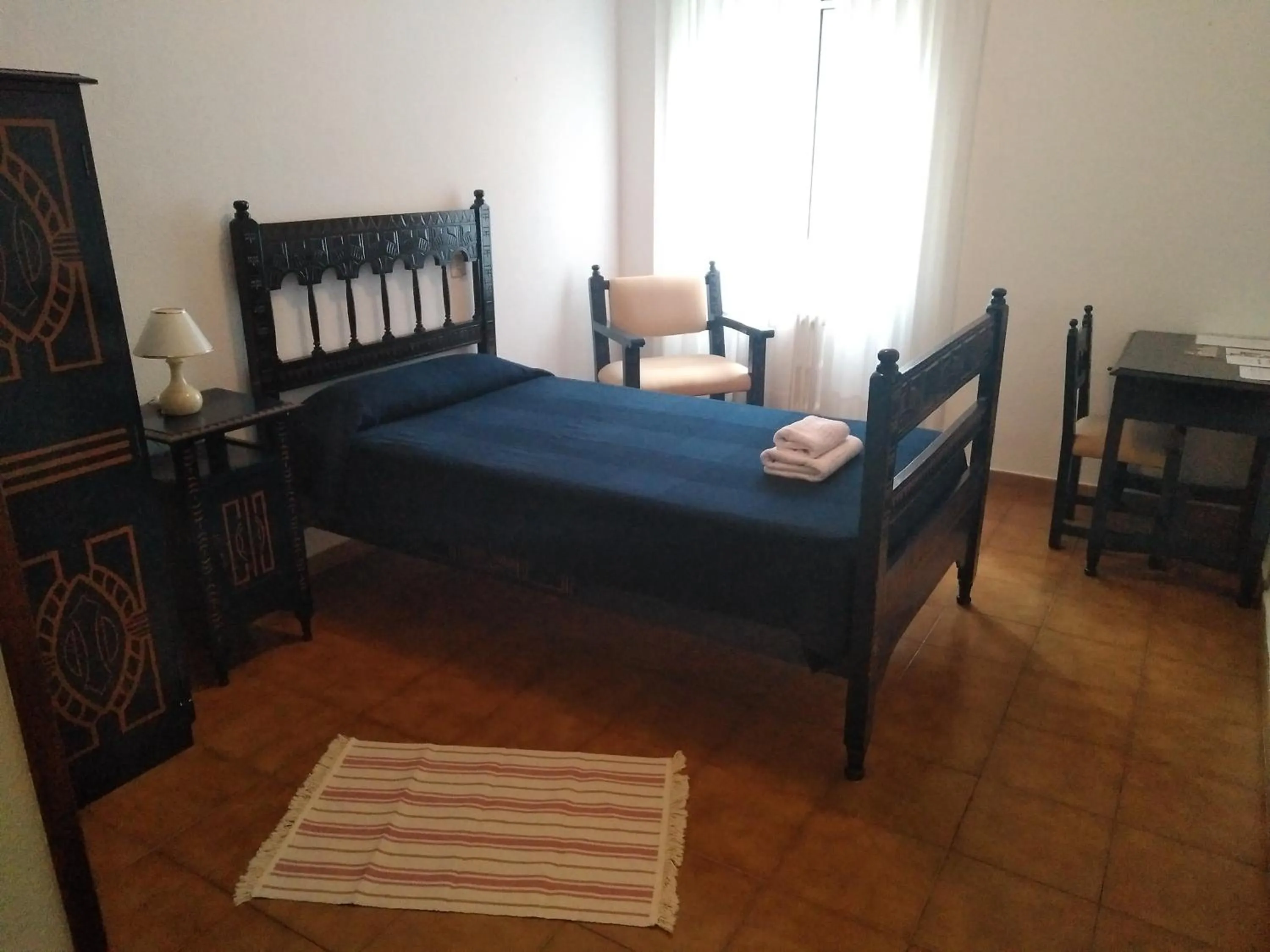 Seating area, Bed in Balneario Casa Pallotti