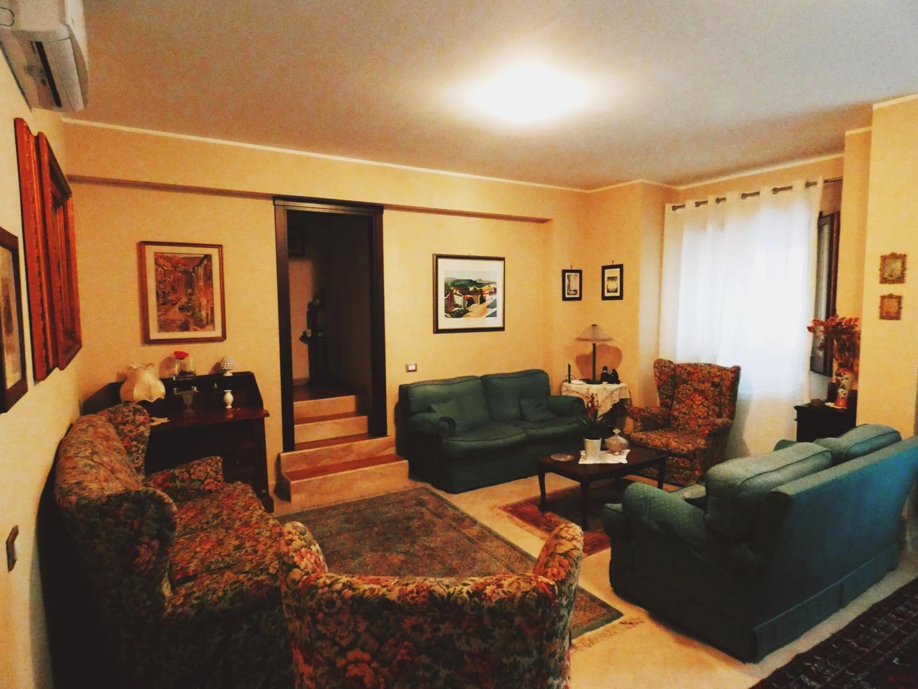 Communal lounge/ TV room in B&B del Corso