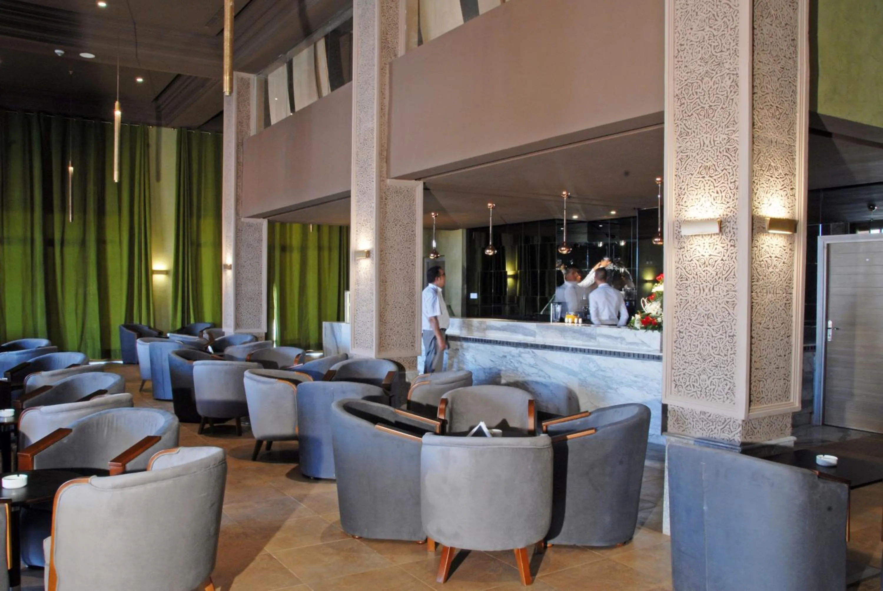 Lounge or bar in Oasis Palm Hotel