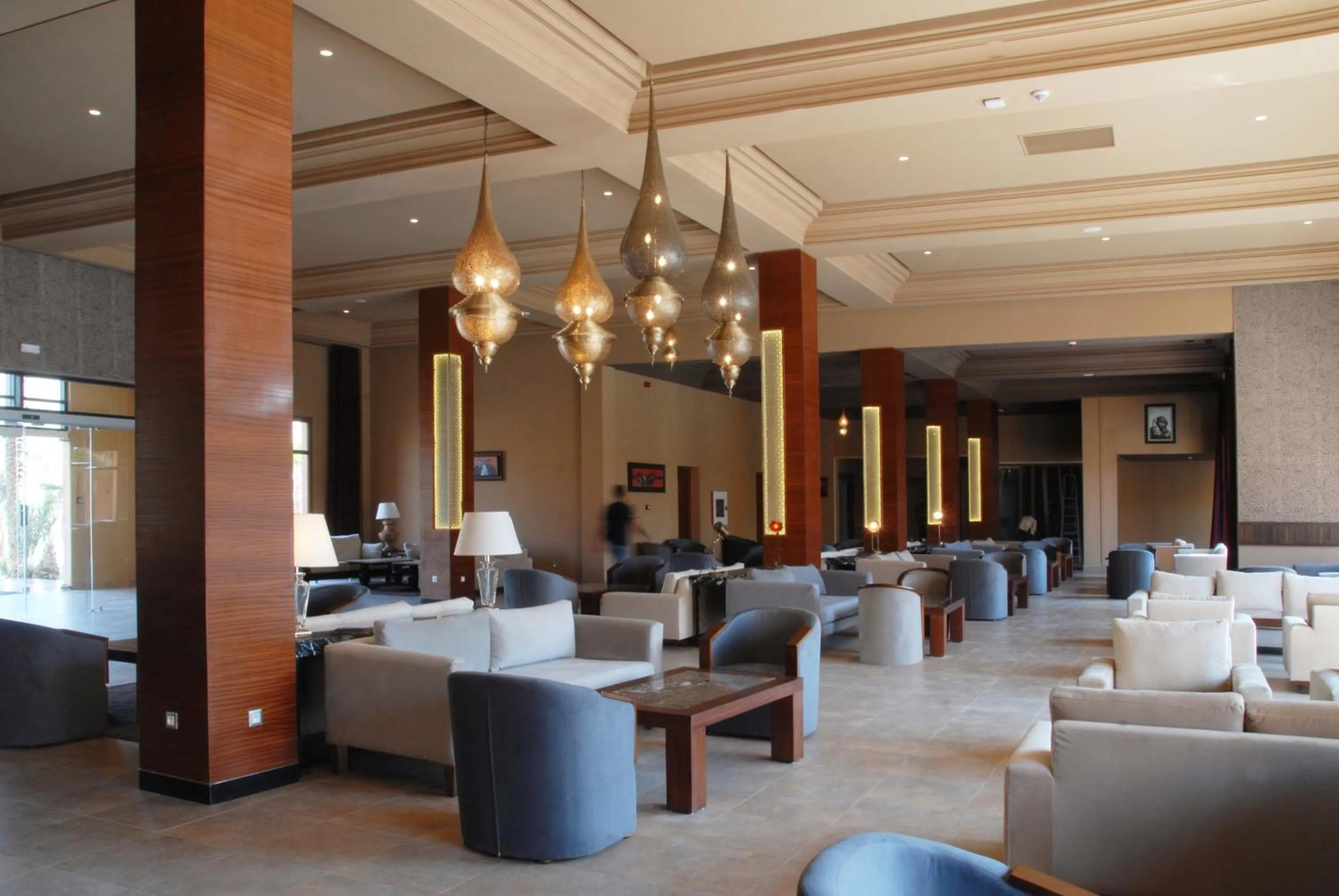 Communal lounge/ TV room in Oasis Palm Hotel