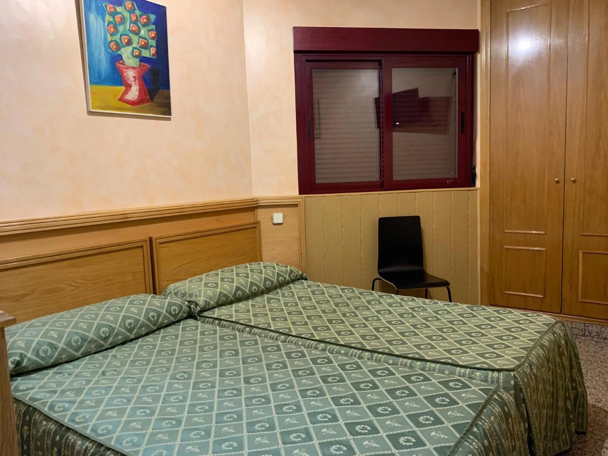 Bed in Hostal Juan XXIII