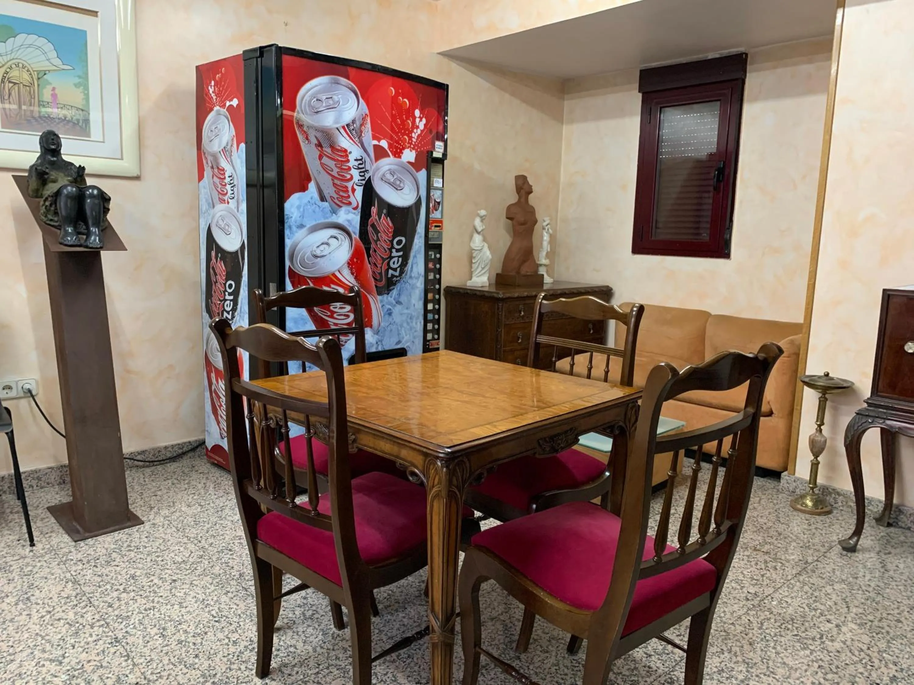 Communal lounge/ TV room in Hostal Juan XXIII