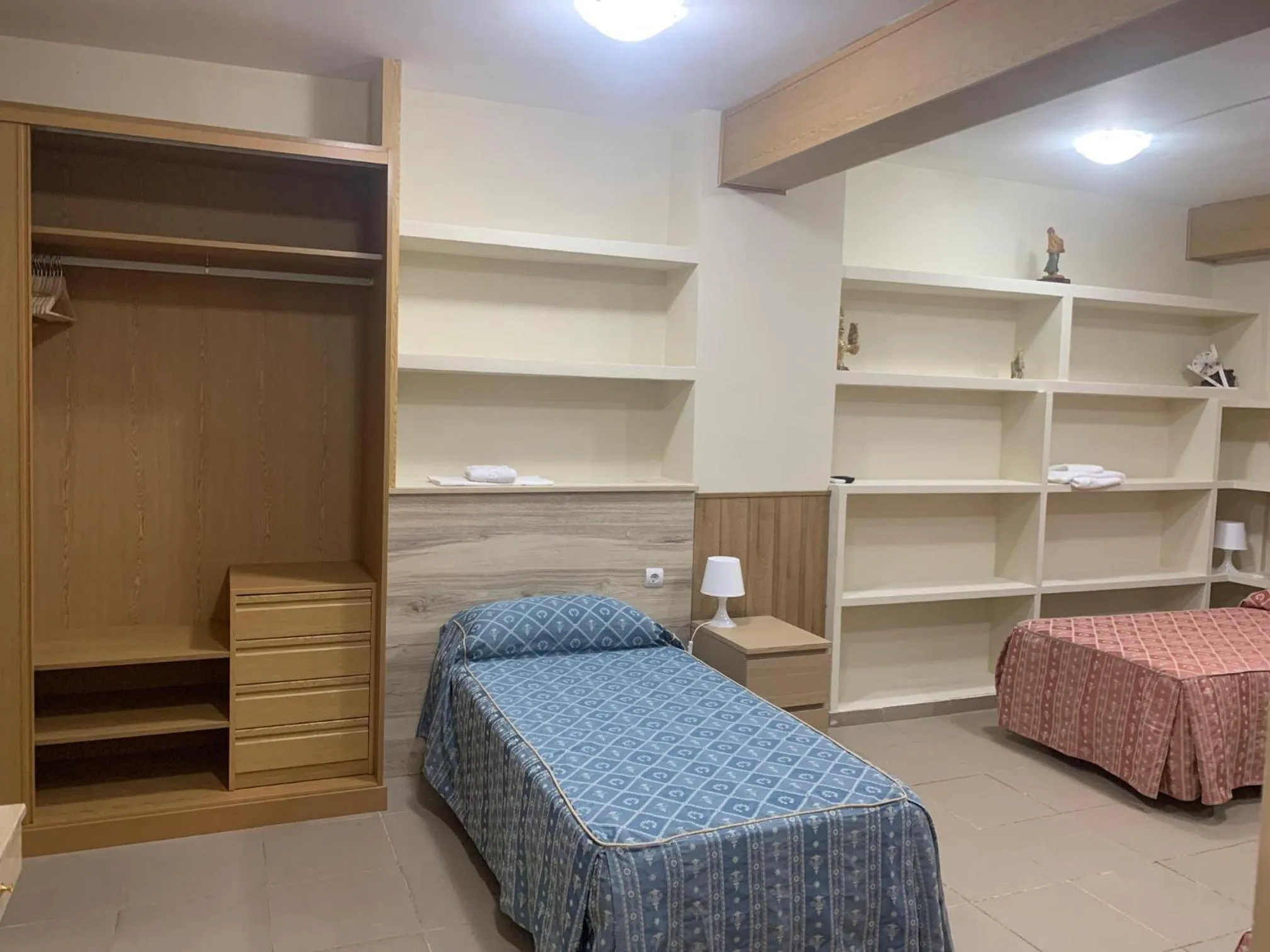 Bed in Hostal Juan XXIII