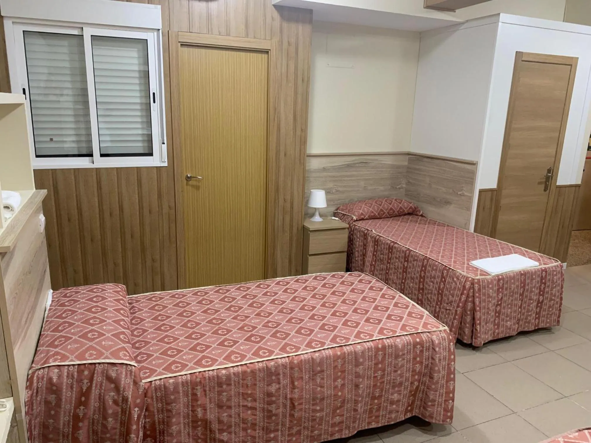 Bed in Hostal Juan XXIII