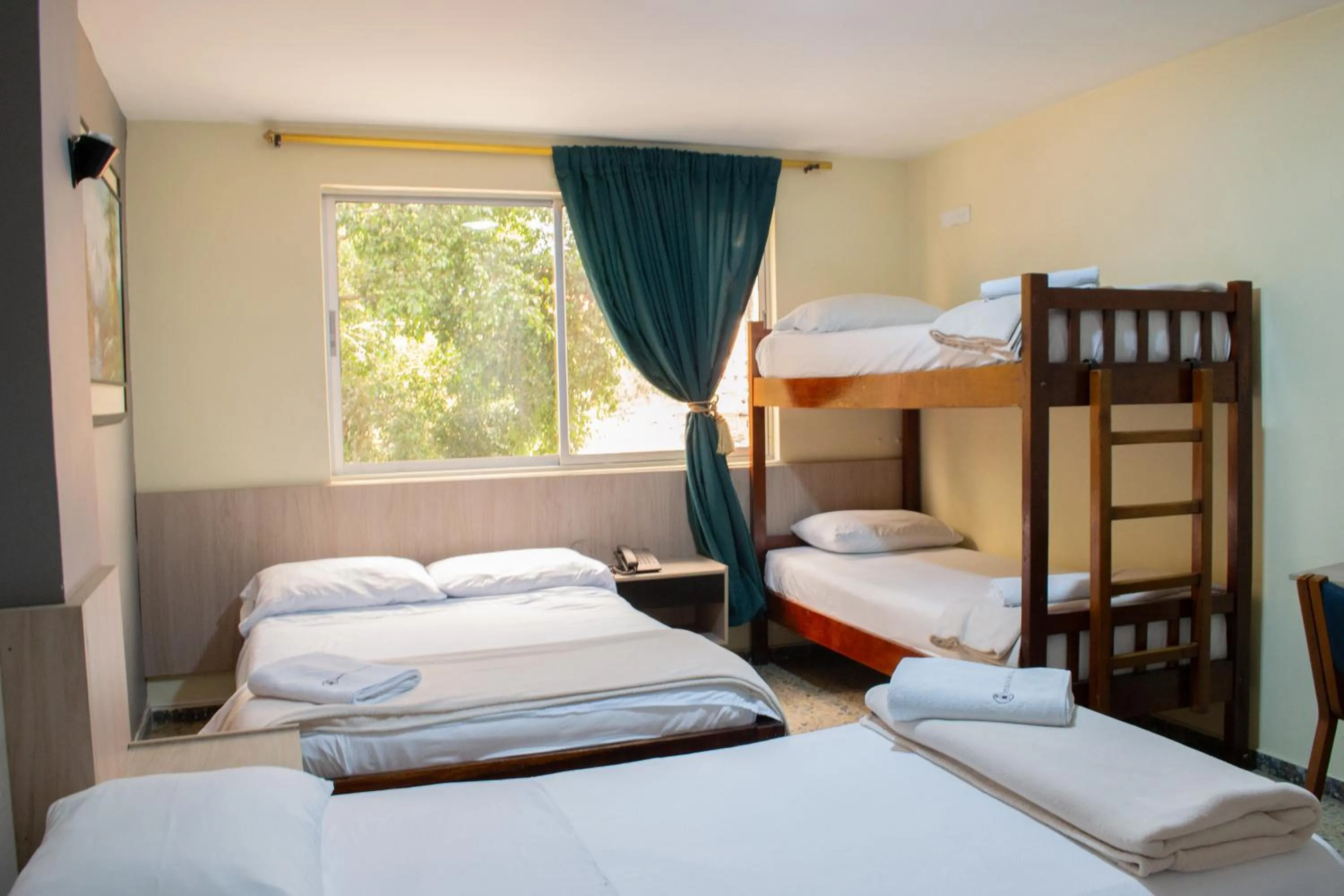 Quadruple Room in Hotel Caldas Plaza
