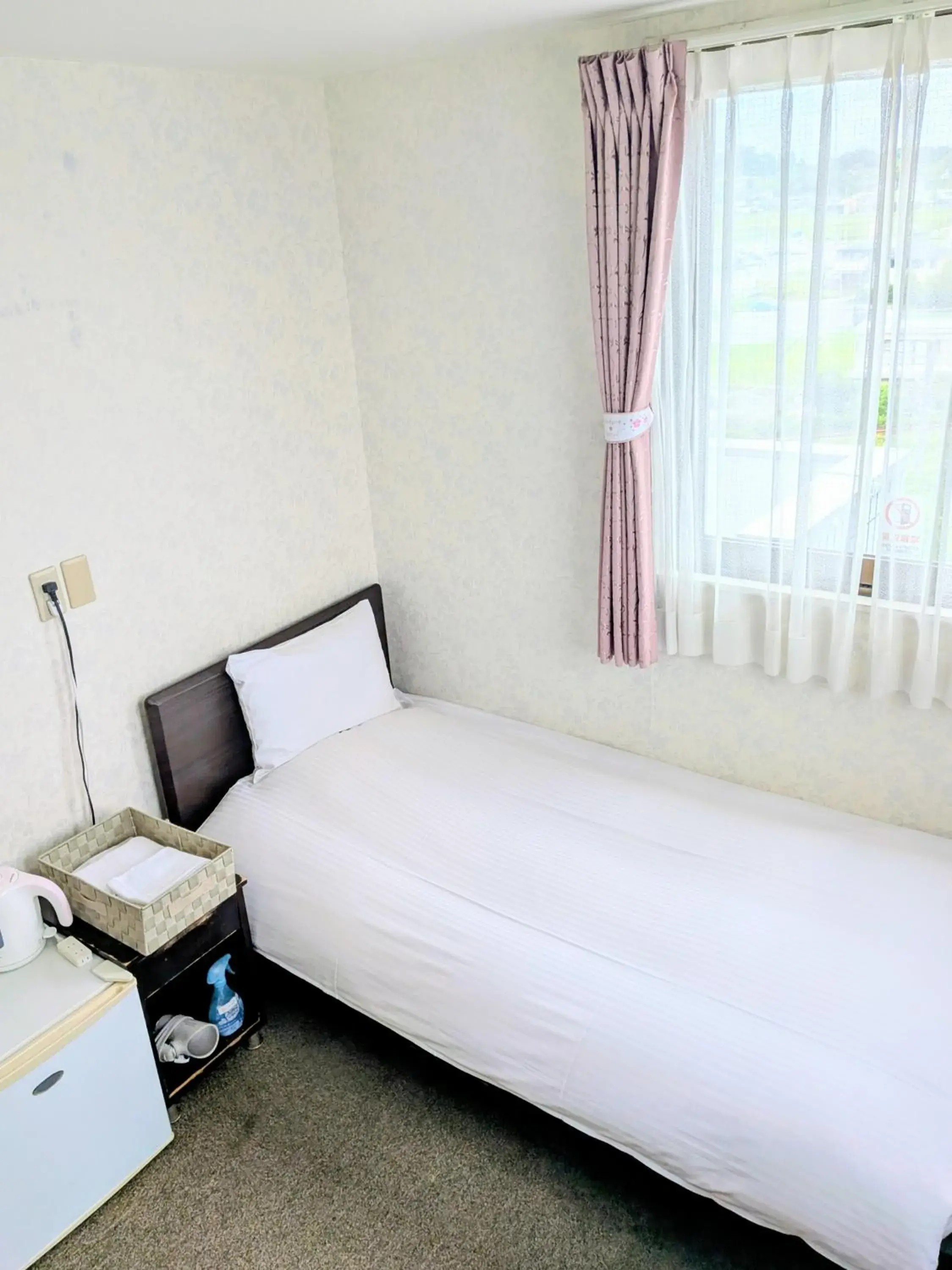 Bed in Sakura Hotel Oami Bed in Sakura Hotel Oami