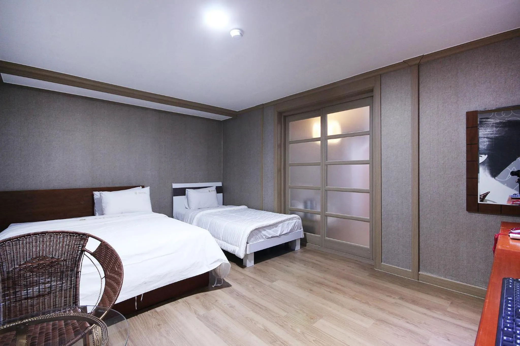 Bed in Happy Q Motel