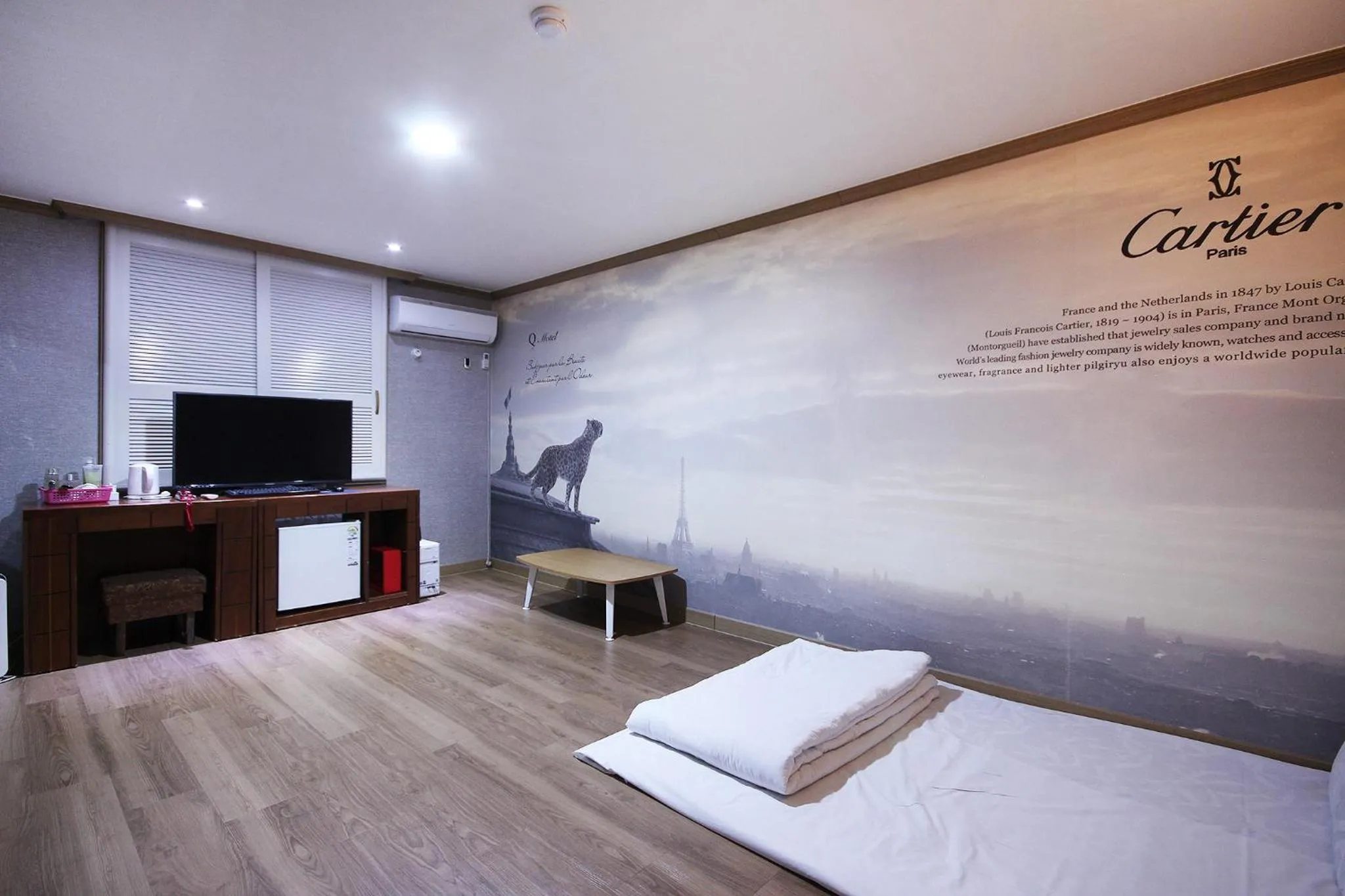 Bed in Happy Q Motel