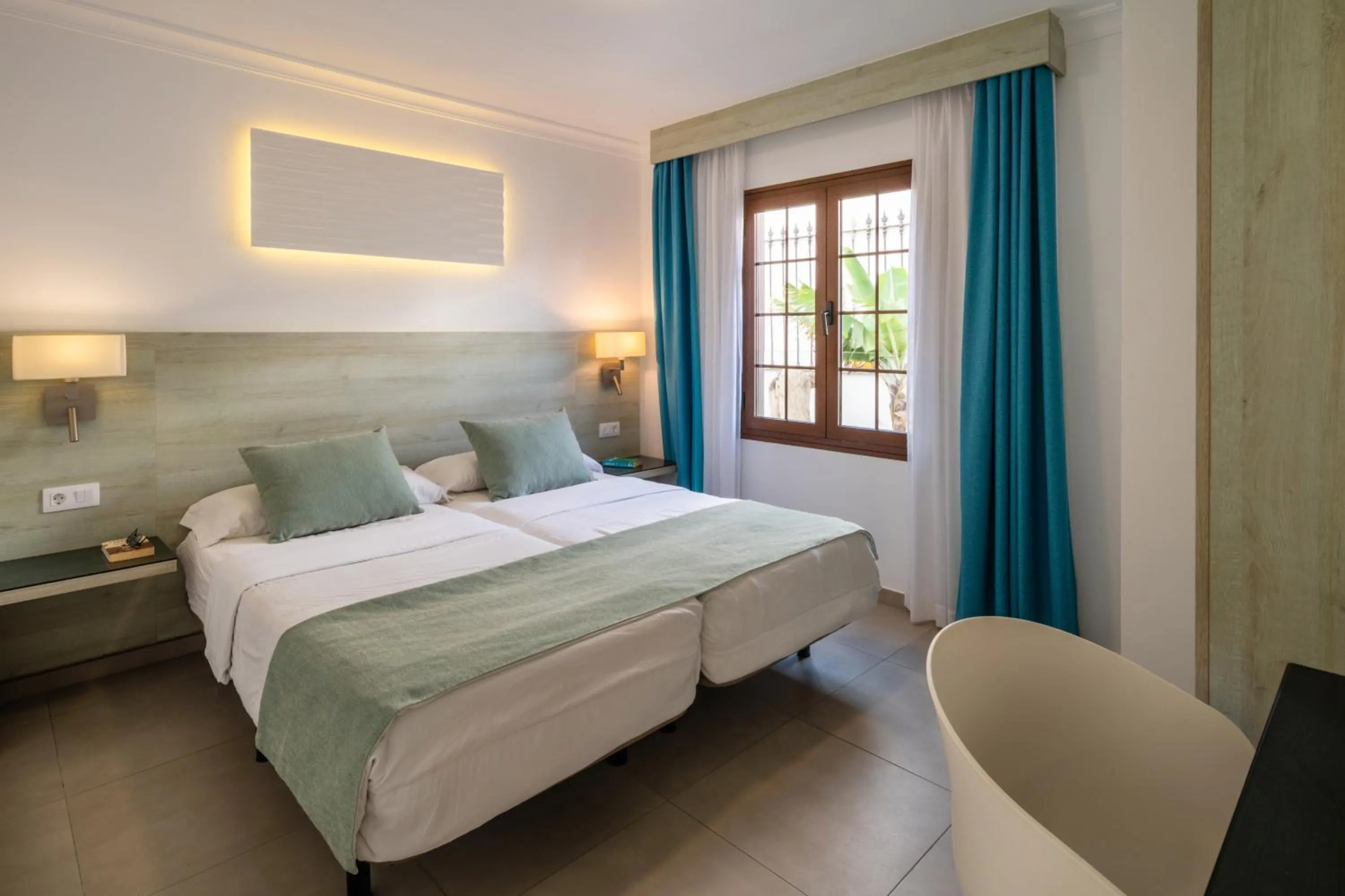 Bed in Suite Hotel Montana Club