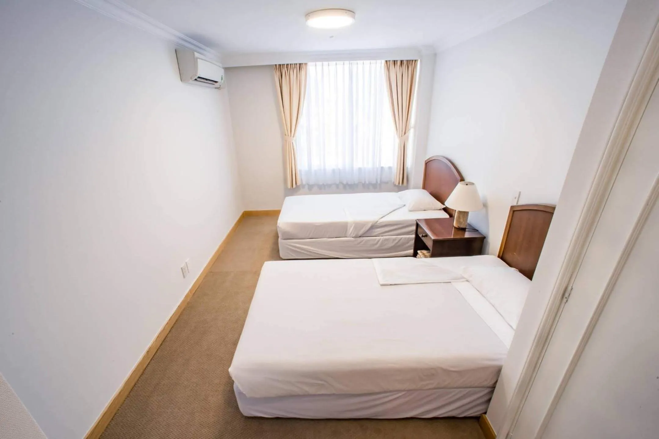 Bed in Saigon Court Serviced Apartment