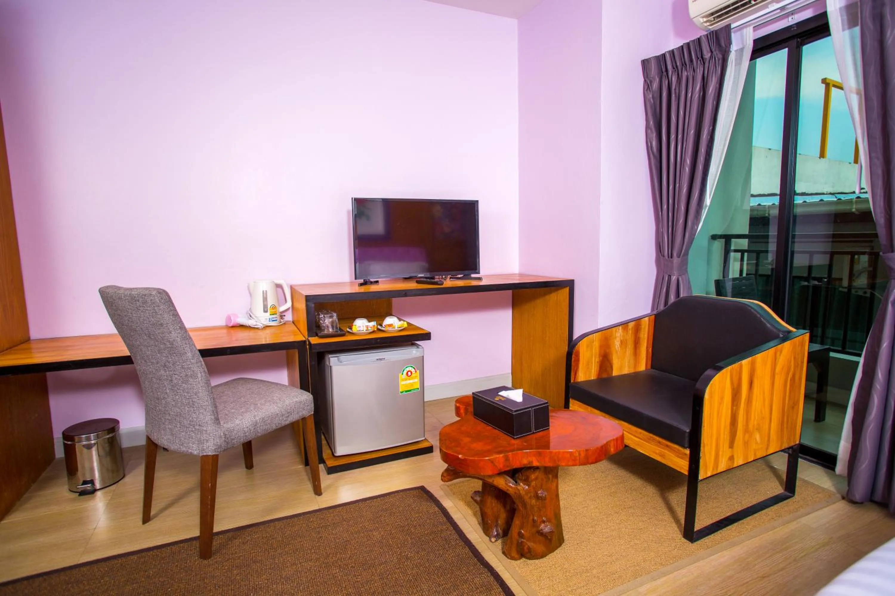 TV and multimedia in Triple B Boutique Residence