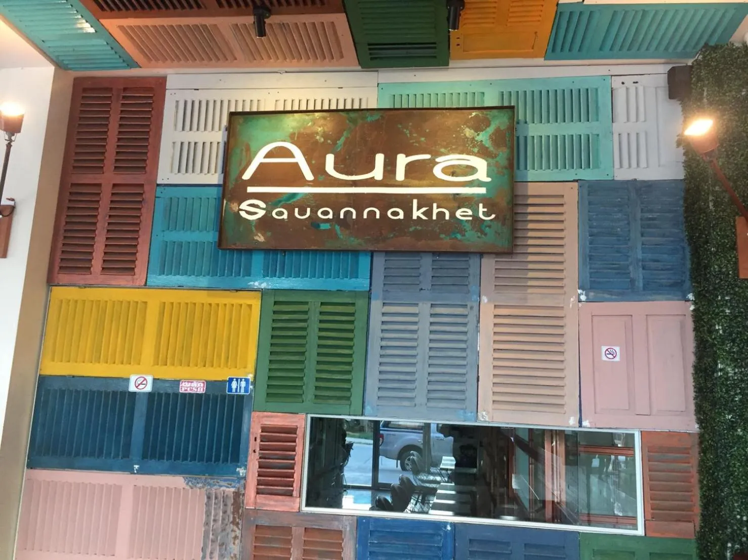 Property logo or sign in Aura Residence