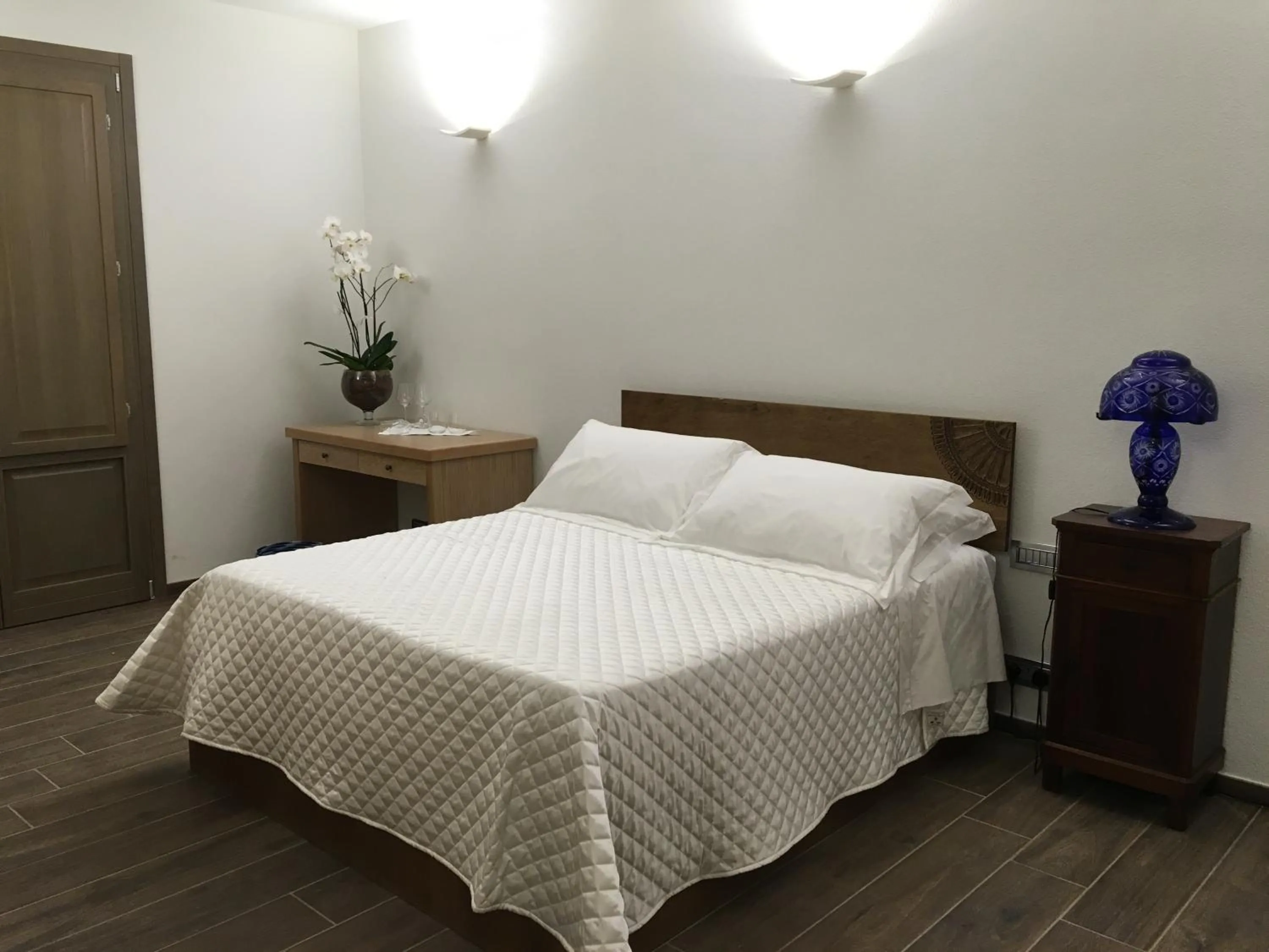 Bed in Serra Niedda Resort & Agriturismo