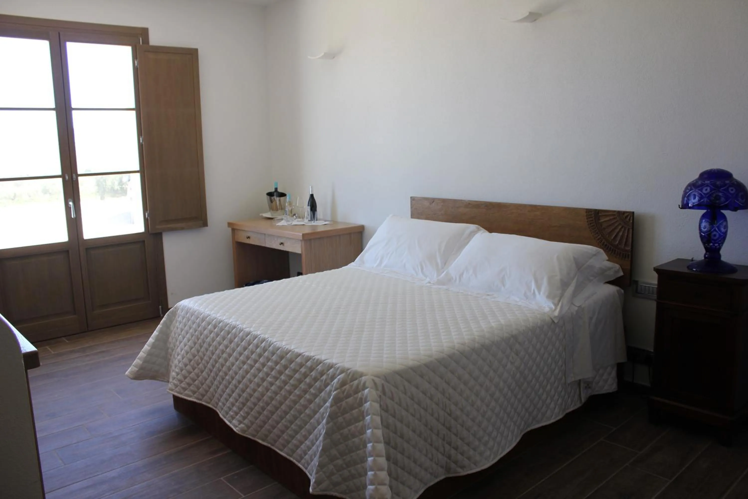 Property building, Bed in Serra Niedda Resort & Agriturismo