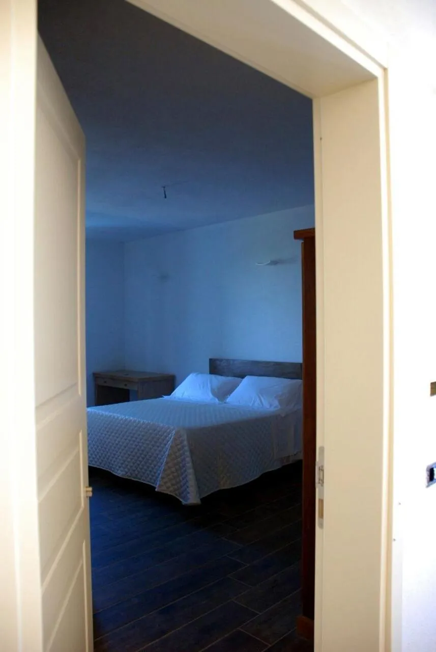 Bed in Serra Niedda Resort & Agriturismo