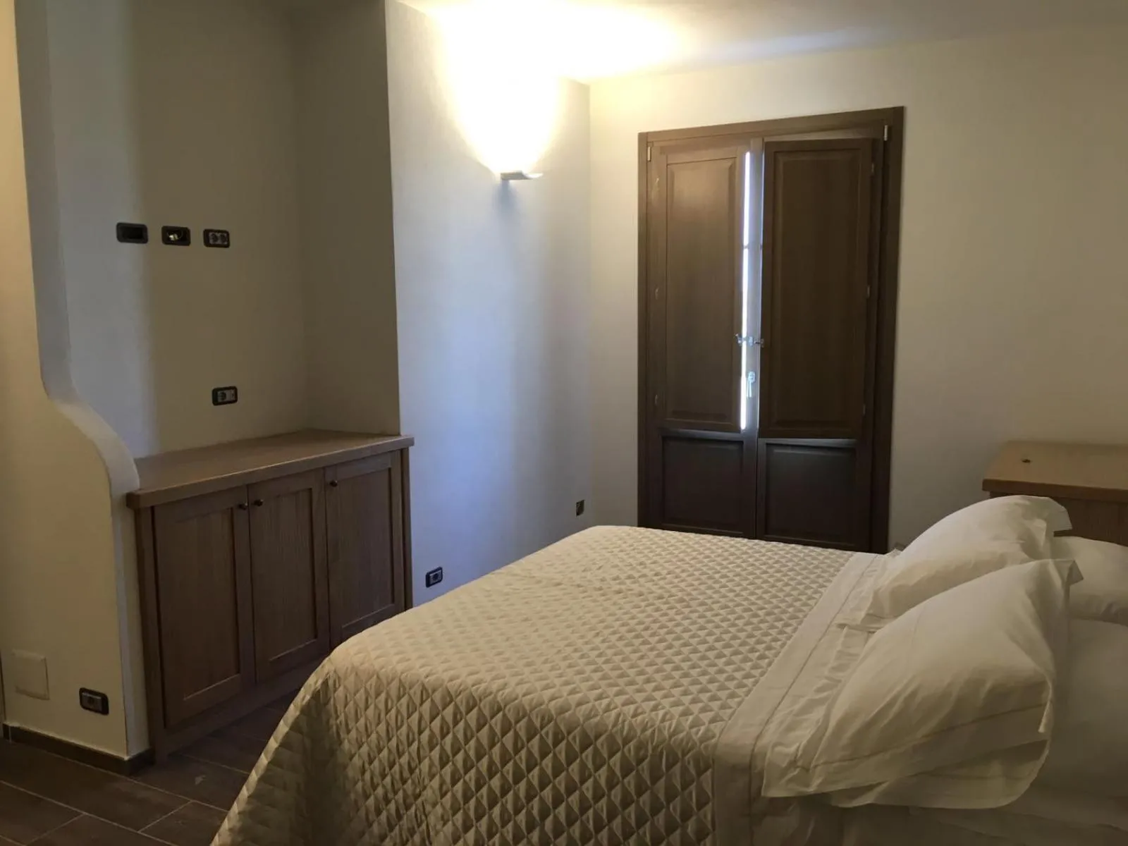 Bed in Serra Niedda Resort & Agriturismo
