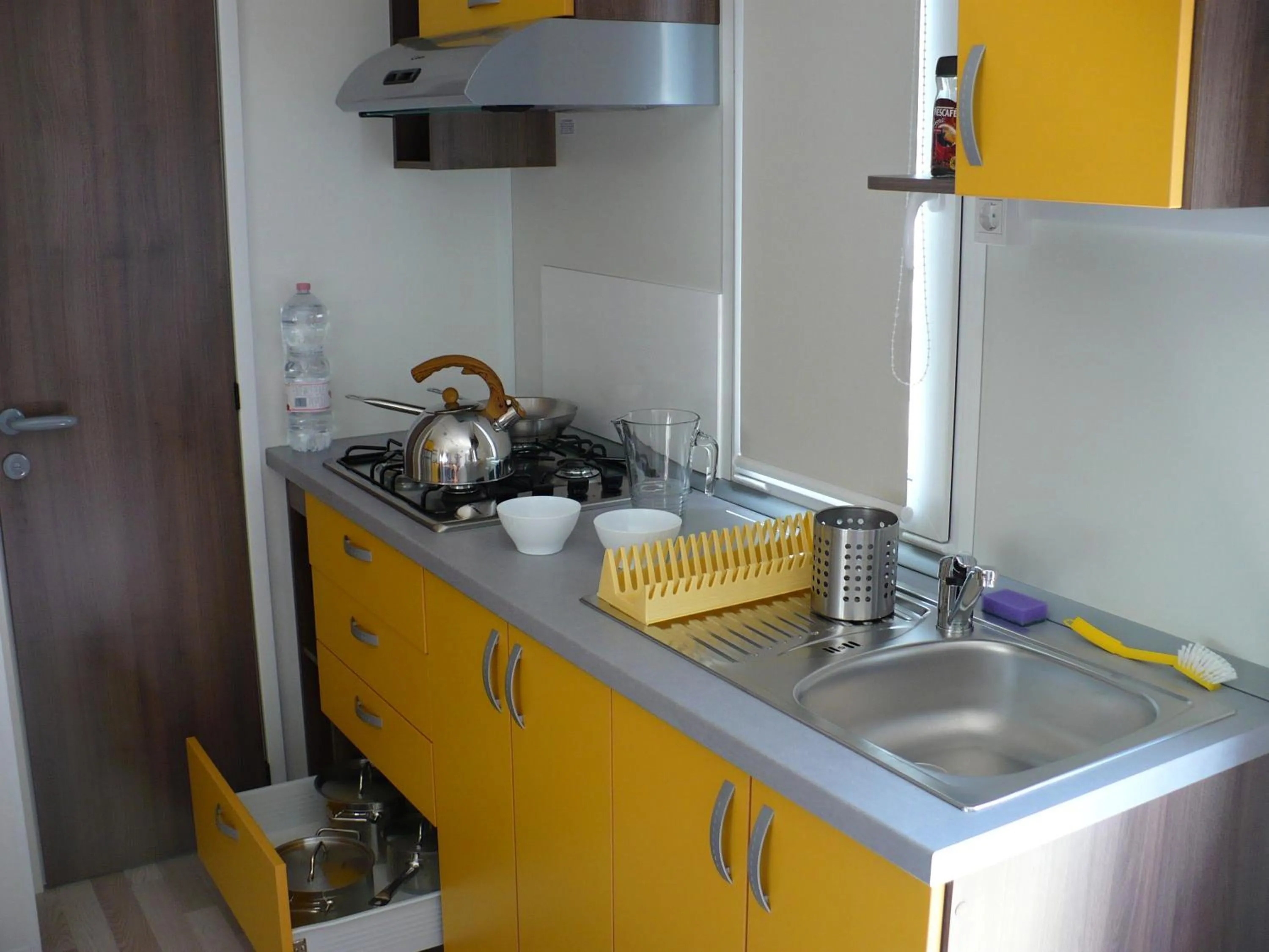Kitchen or kitchenette in Victoria Mobilehome Tortoreto Lido