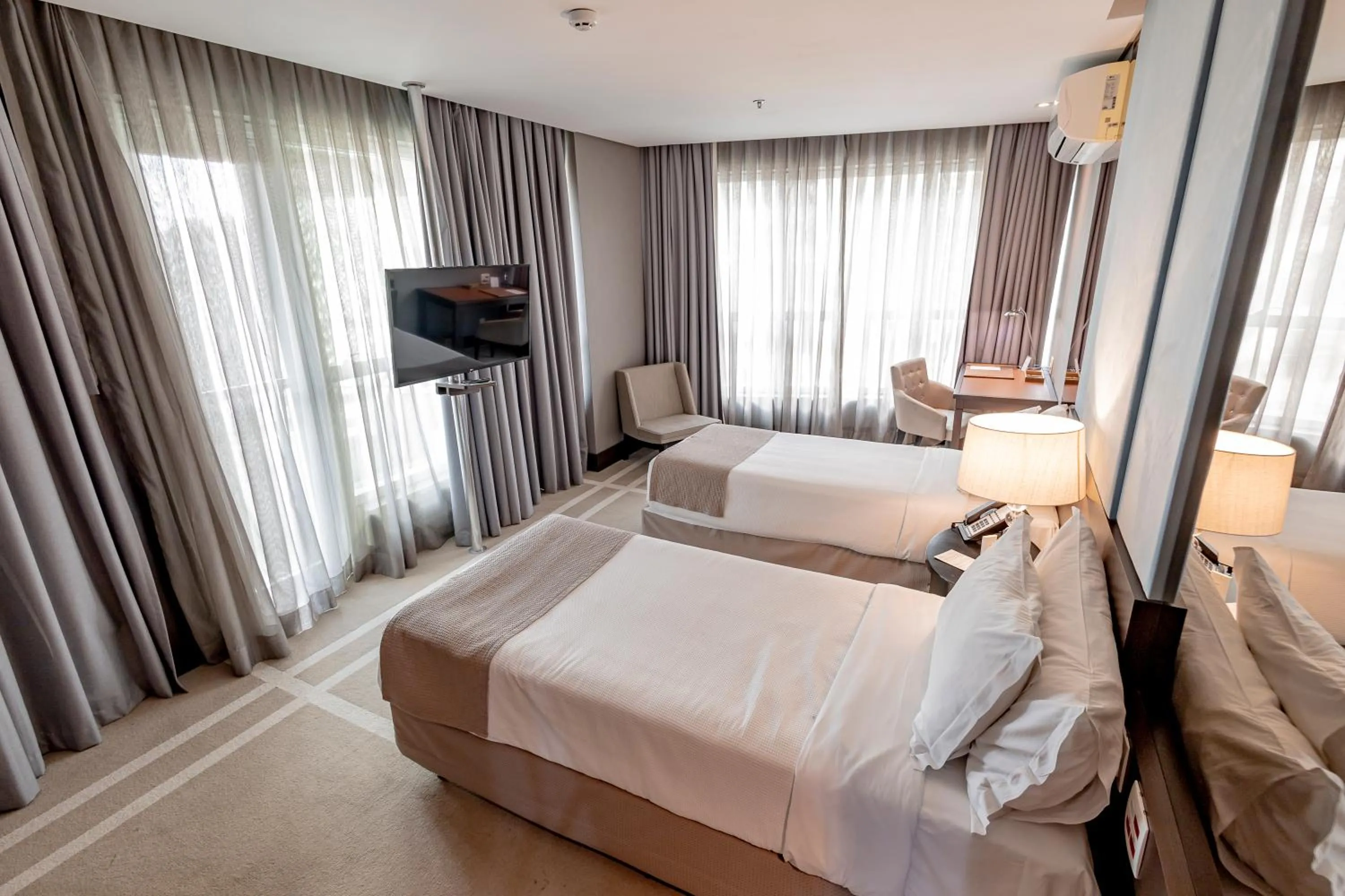 Bed in Hotel Cadoro São Paulo