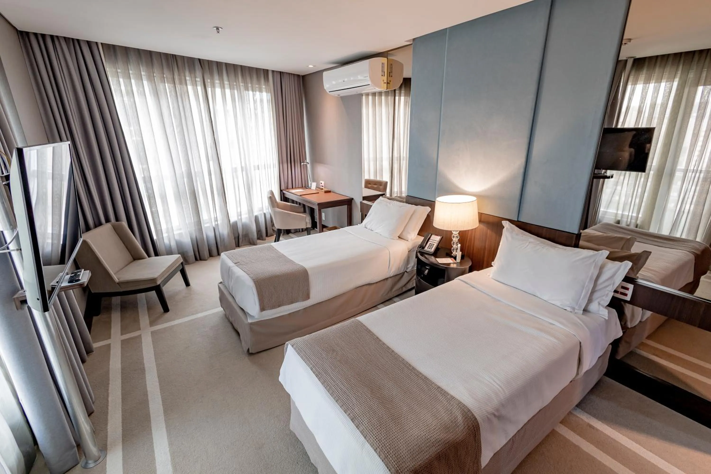 Bed in Hotel Cadoro São Paulo