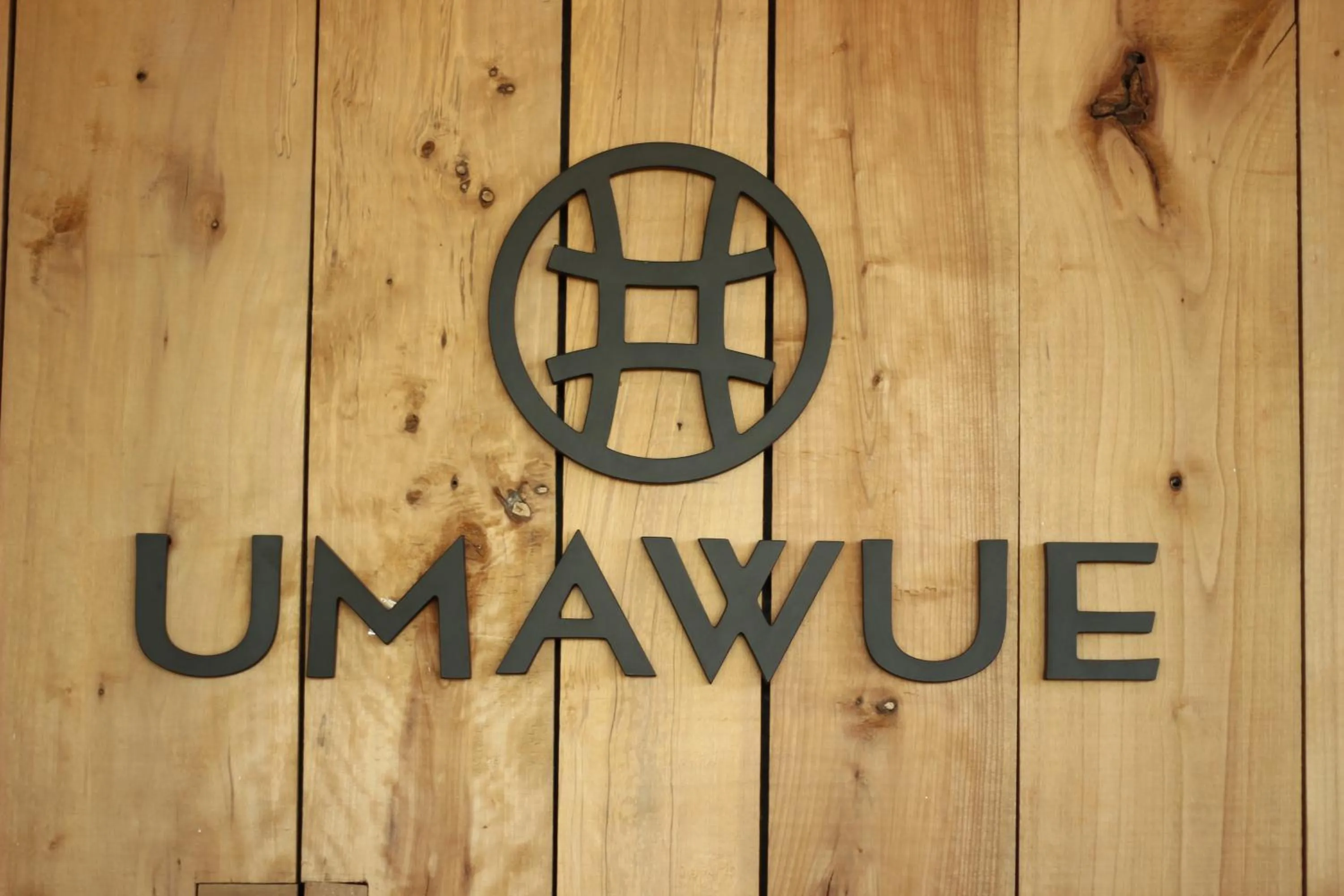Property logo or sign in Hotel Umawue