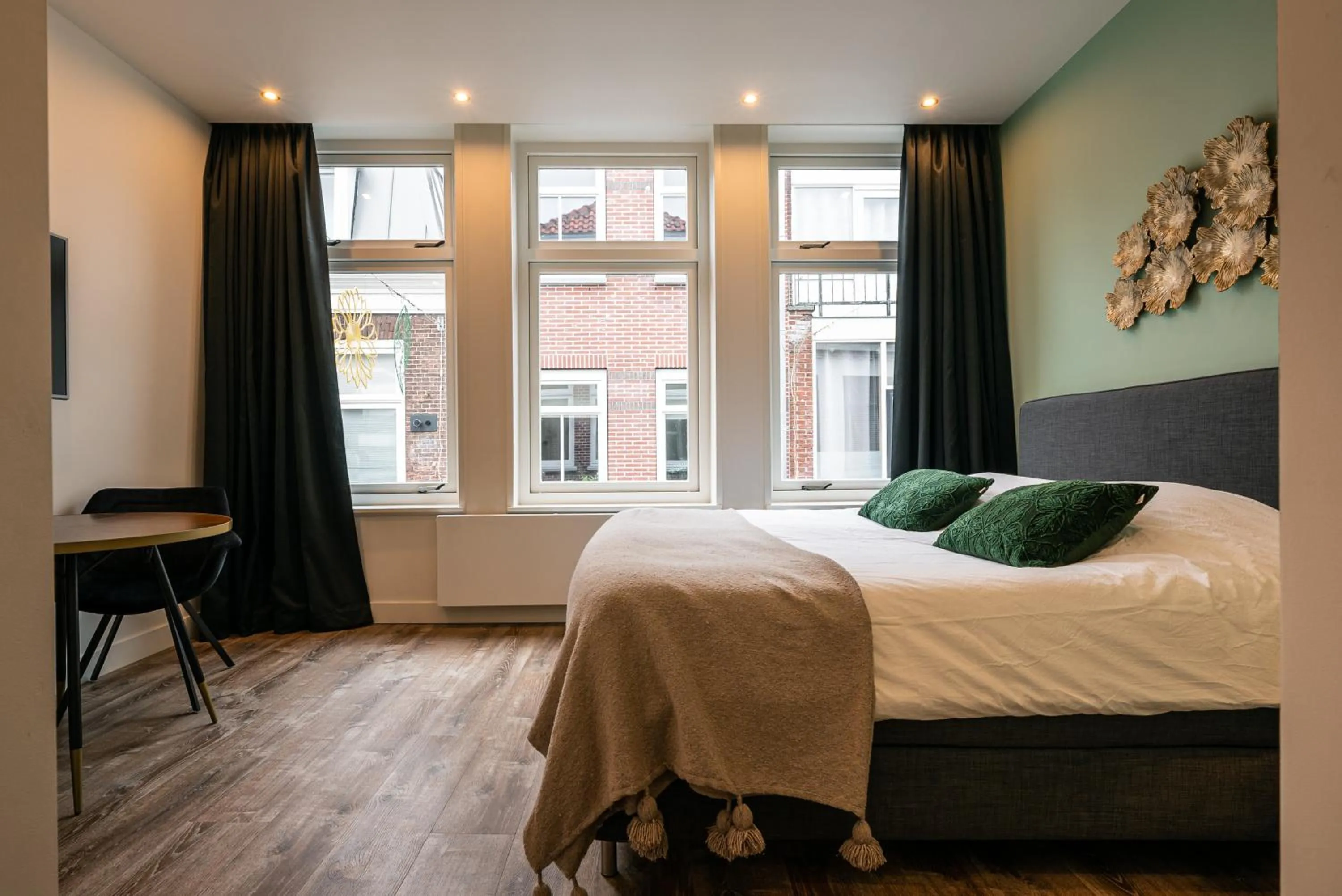 Bed in Familie Hotel & Apartments Alkmaar