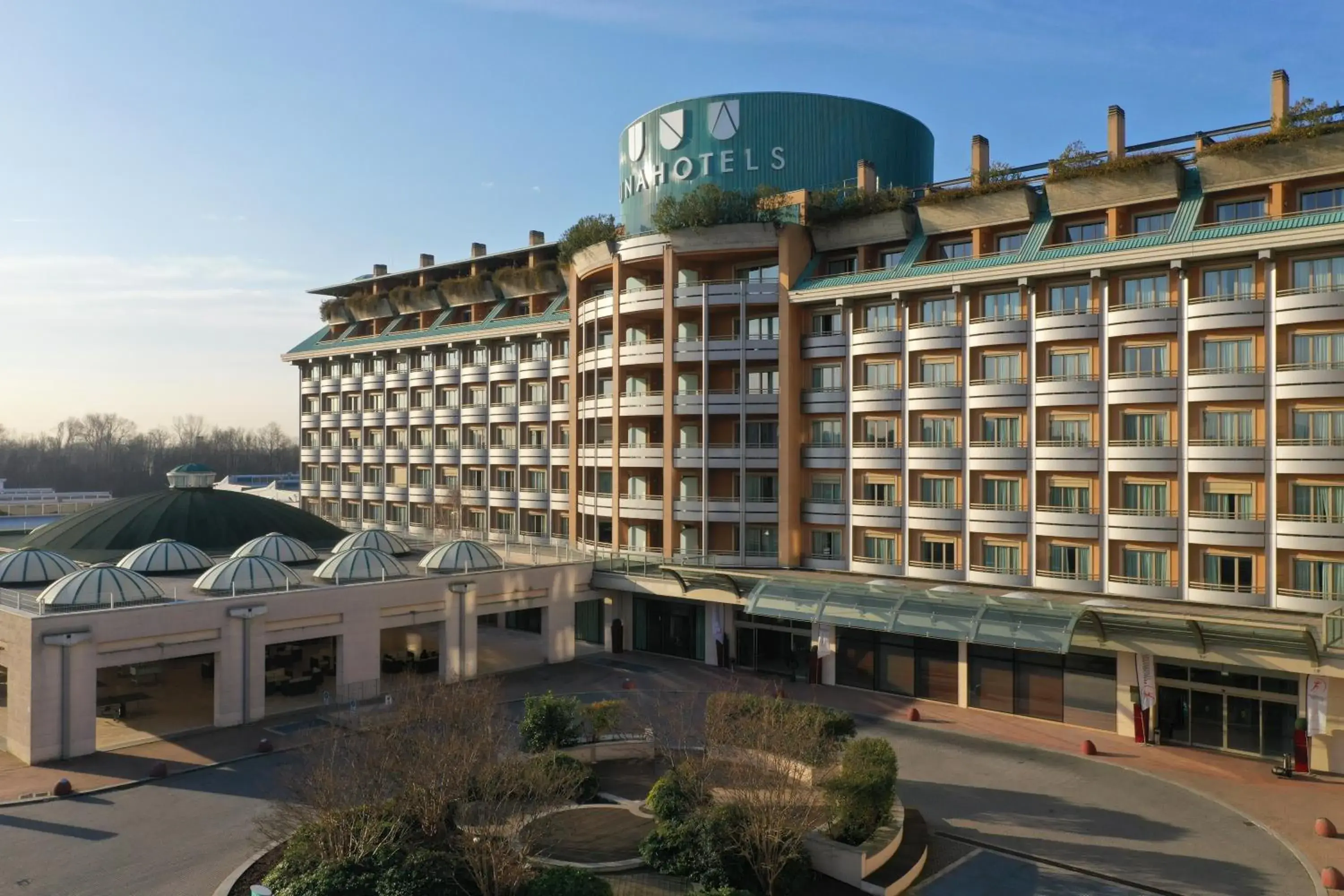 Facade/entrance in UNA Hotels Expo Fiera Milano Facade/entrance in UNA Hotels Expo Fiera Milano