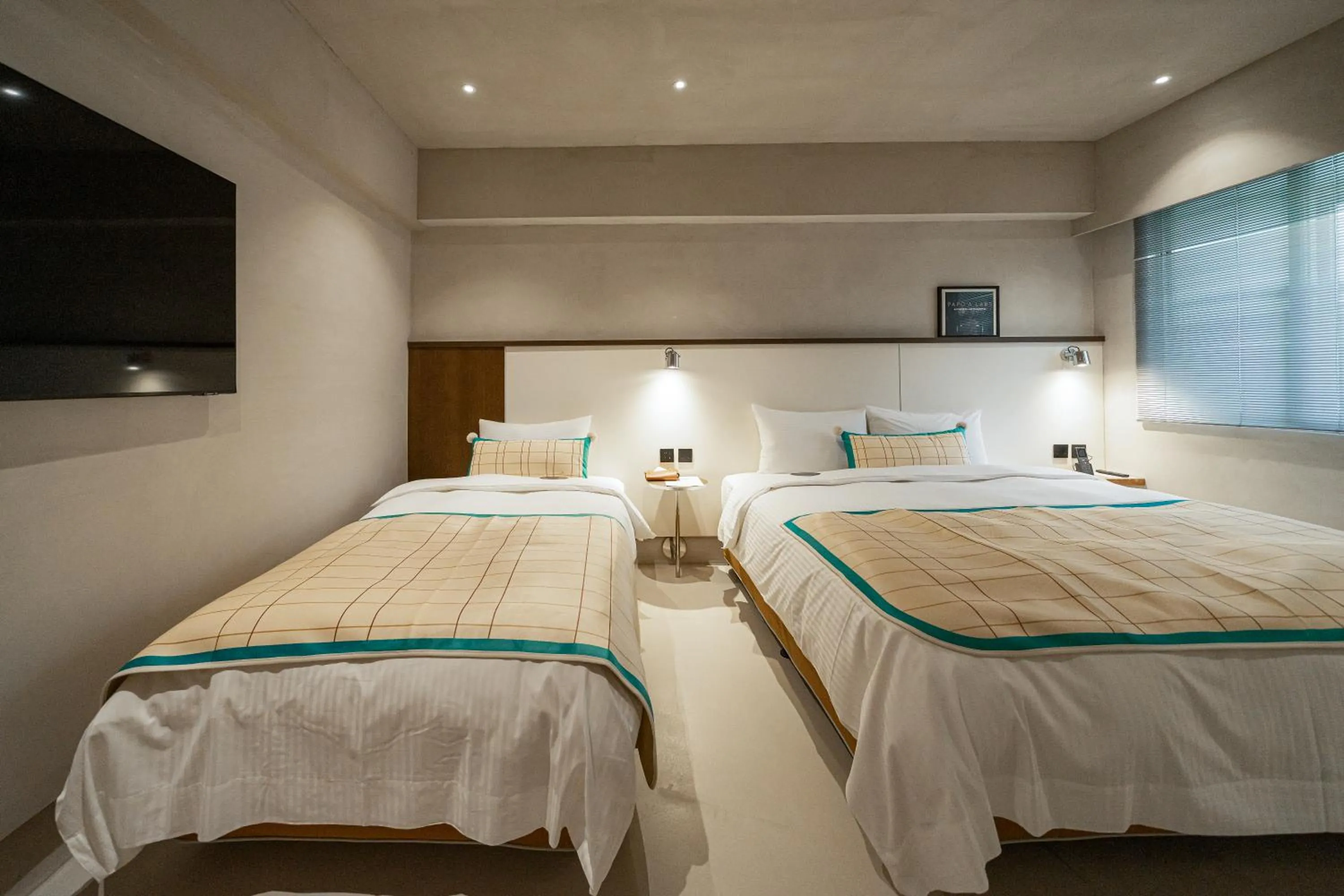 Photo of the whole room, Bed in PAPO'A Labs
