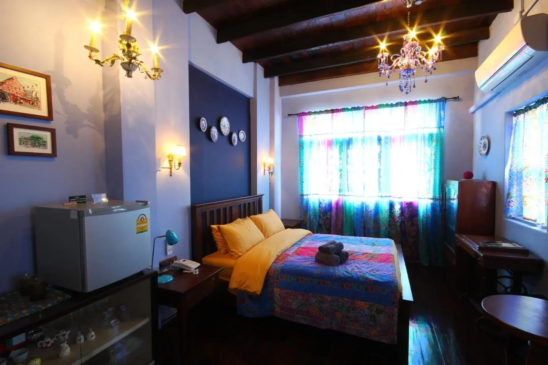 Bed in Baan Nai Nakhon Bed in Baan Nai Nakhon