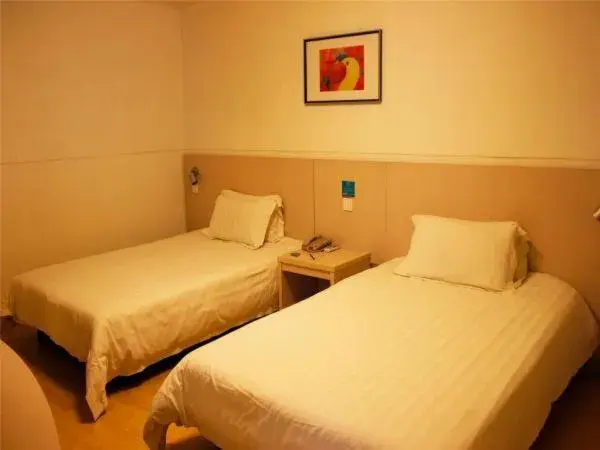 Bed in Jingjiang Inn Xi'an Jianguomen Bed in Jingjiang Inn Xi'an Jianguomen