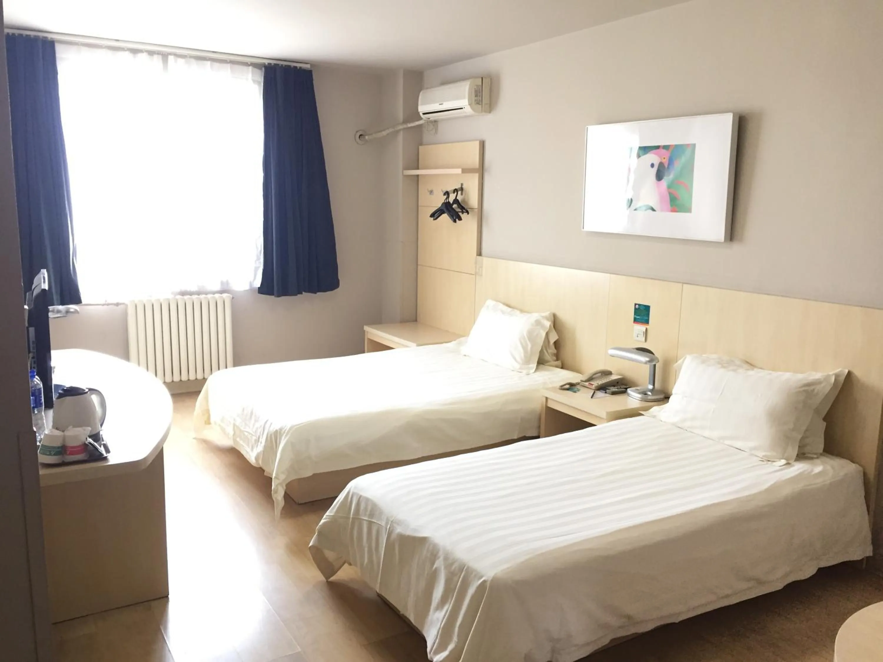 Bedroom in Jinjiang Inn Beijing South Station