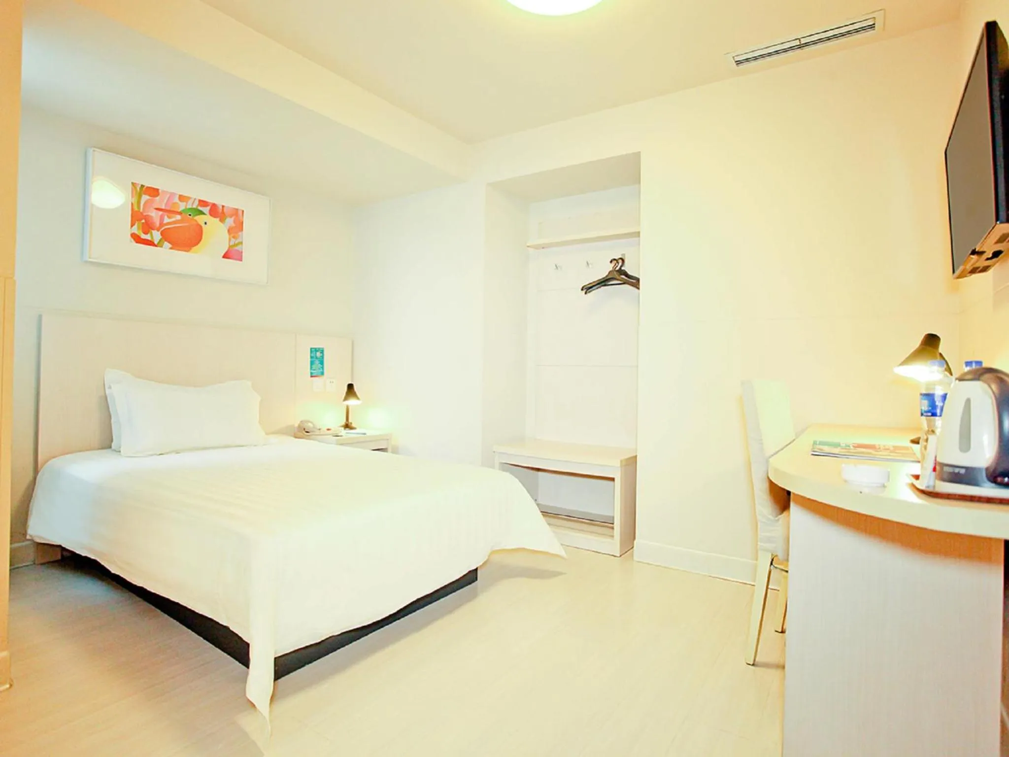 Bedroom, Bed in Jingjiang Inn Taiyuan Fuxi Street Wanda Plaza