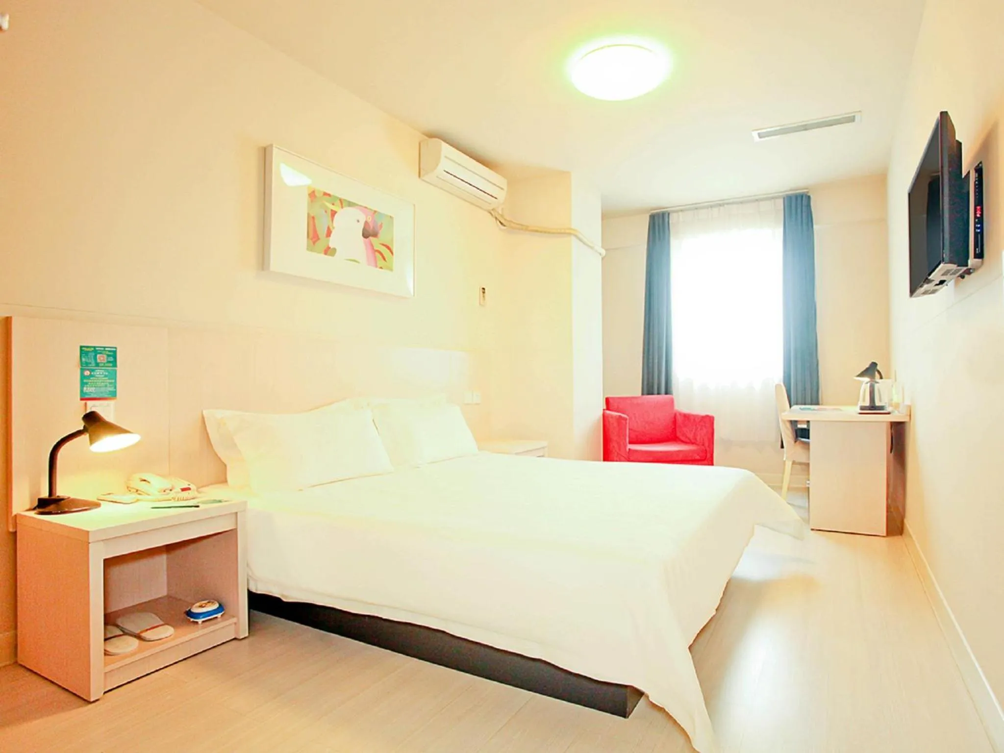 Living room, Bed in Jingjiang Inn Taiyuan Fuxi Street Wanda Plaza
