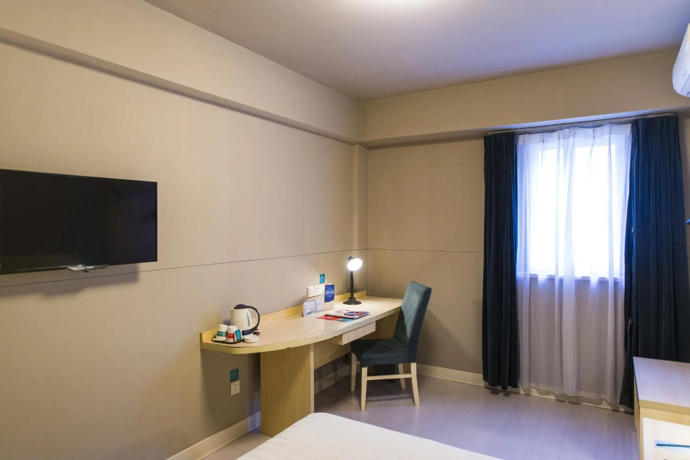 Bedroom in Jinjiang Inn Kunshan Railway Station