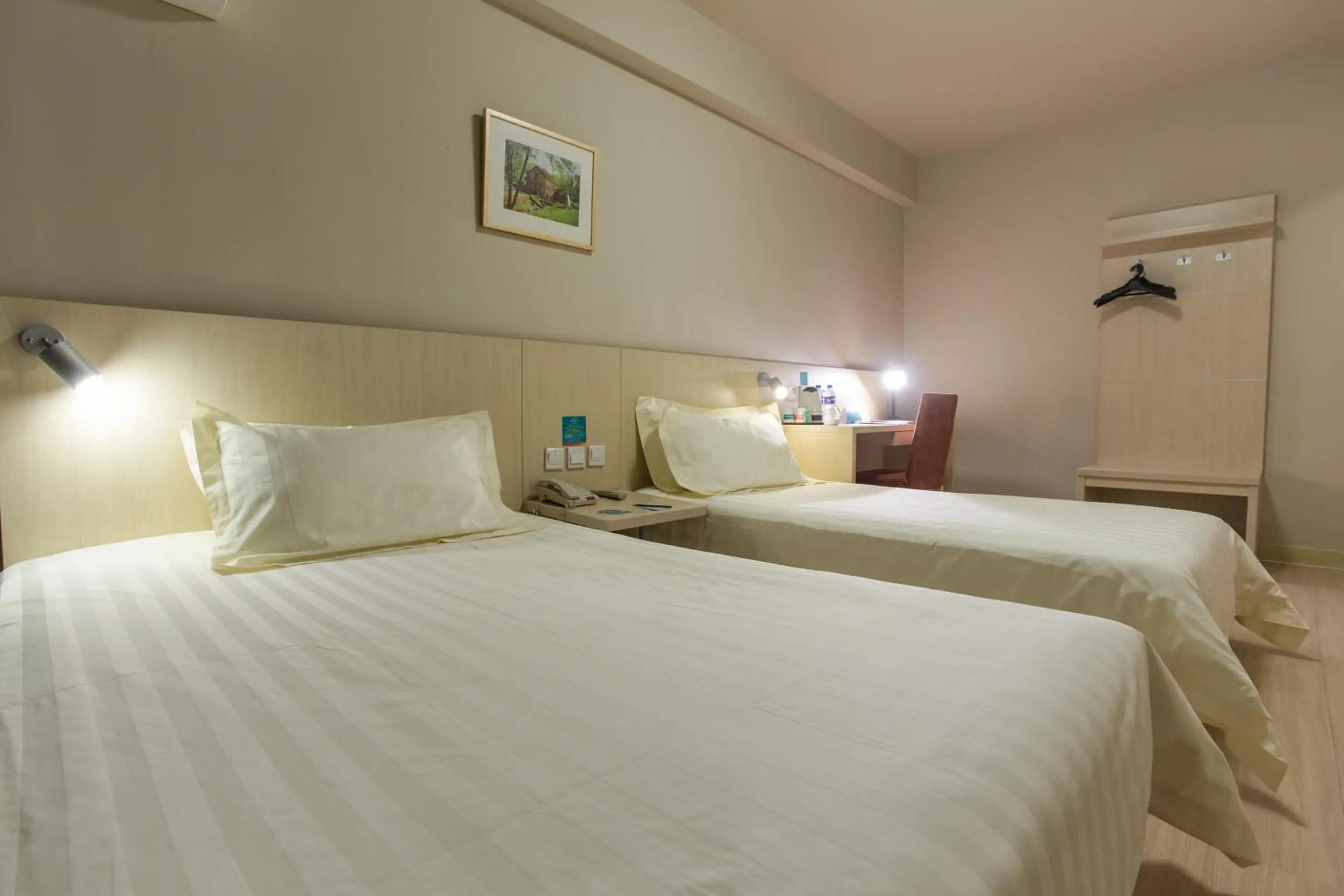 Bed in Jinjiang Inn Beijing Hepingmen Bed in Jinjiang Inn Beijing Hepingmen