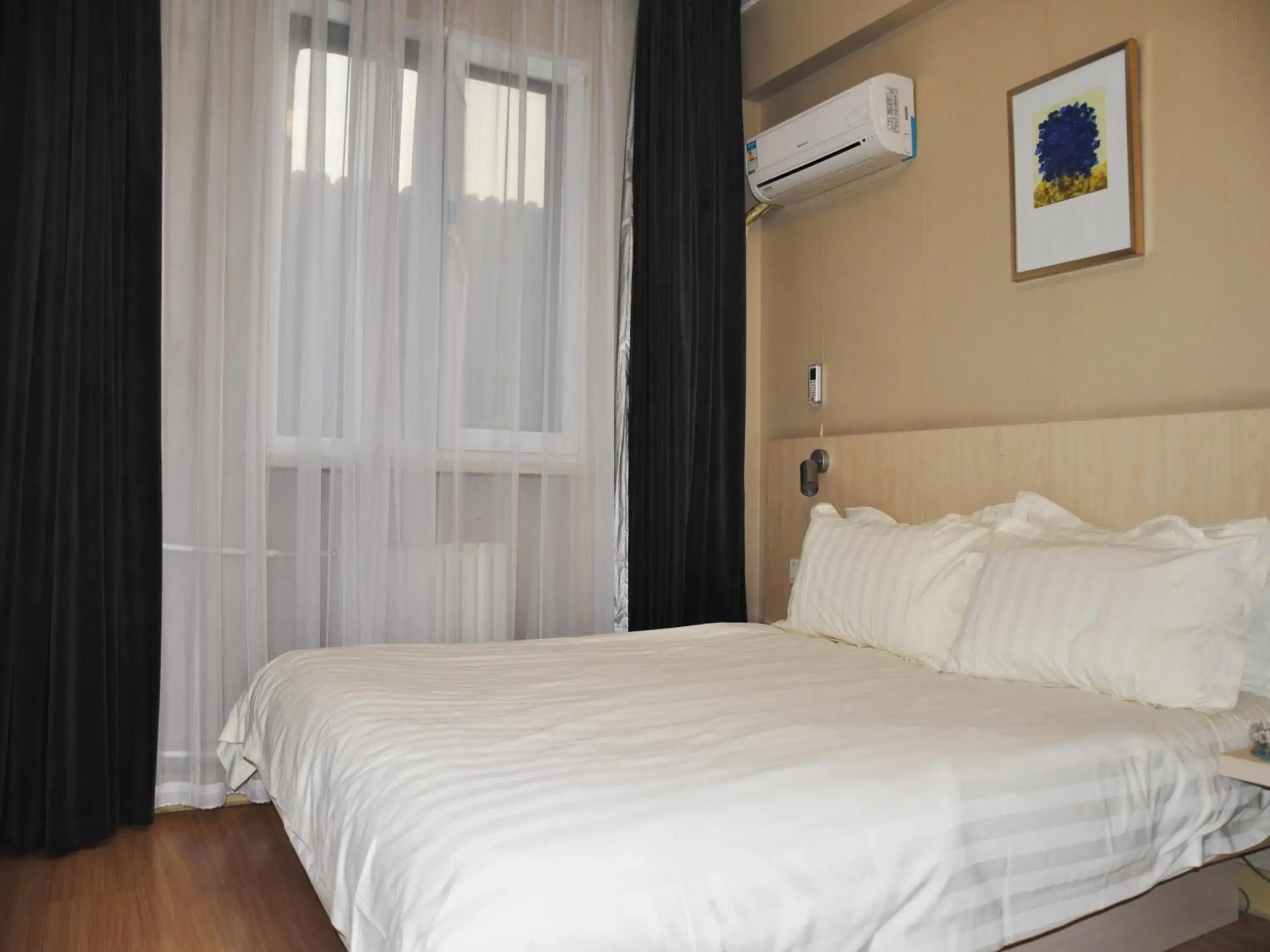 Bed in Jinjiang Inn Beijing Hepingmen Bed in Jinjiang Inn Beijing Hepingmen