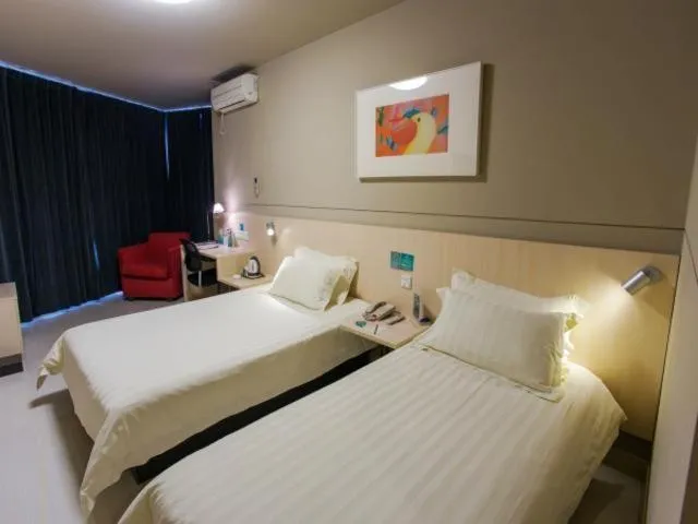 Bed in Jinjiang Inn Changzhou Wujin Chunqiu Yancheng Yongsheng Road