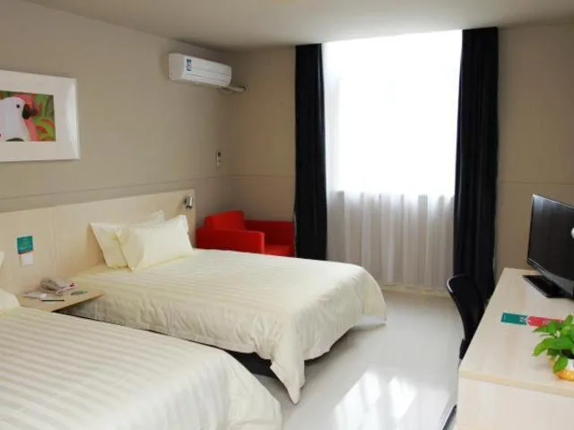 Bed in Jinjiang Inn Taizhou Xinghua Dainan Town Government