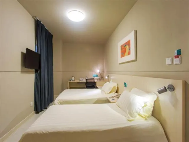 Bed in Jinjiang Inn Shaoxing Keqiao Wanda Plaza Convention and Exhibition Center Hotel