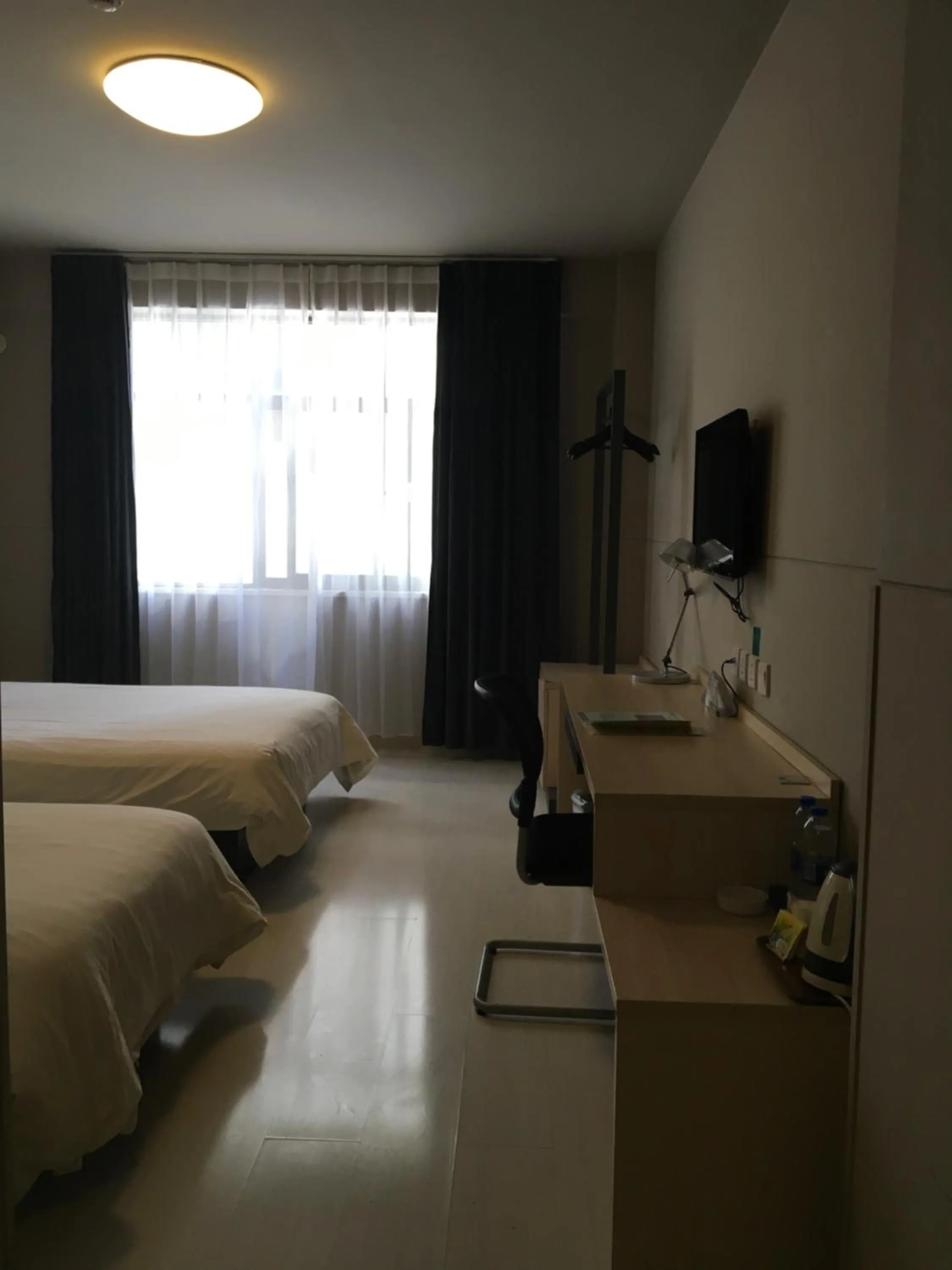 Bed in Jinjiang Inn Lijiang Ancient City Qixing Street