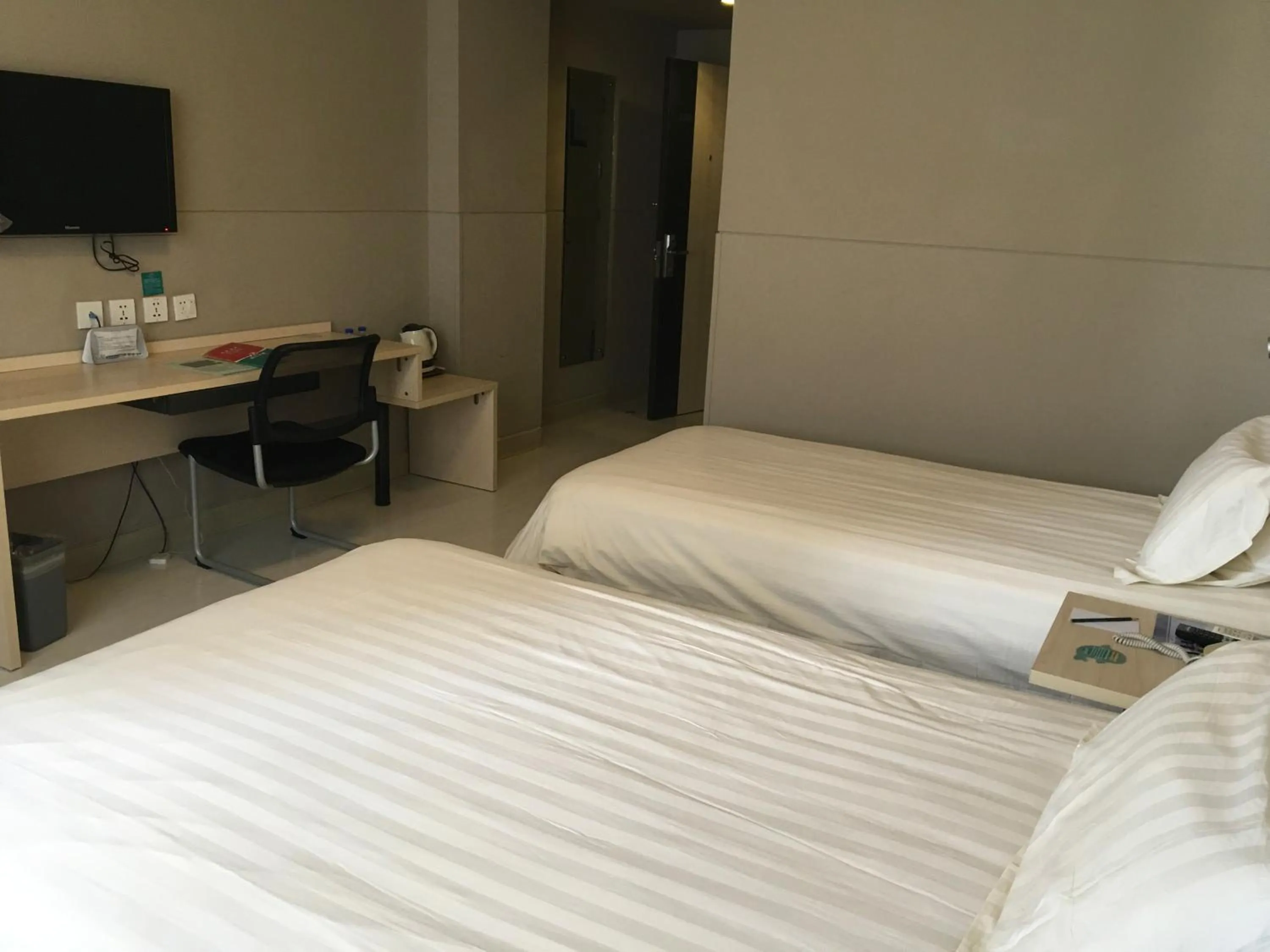 Bed in Jinjiang Inn Lijiang Ancient City Qixing Street