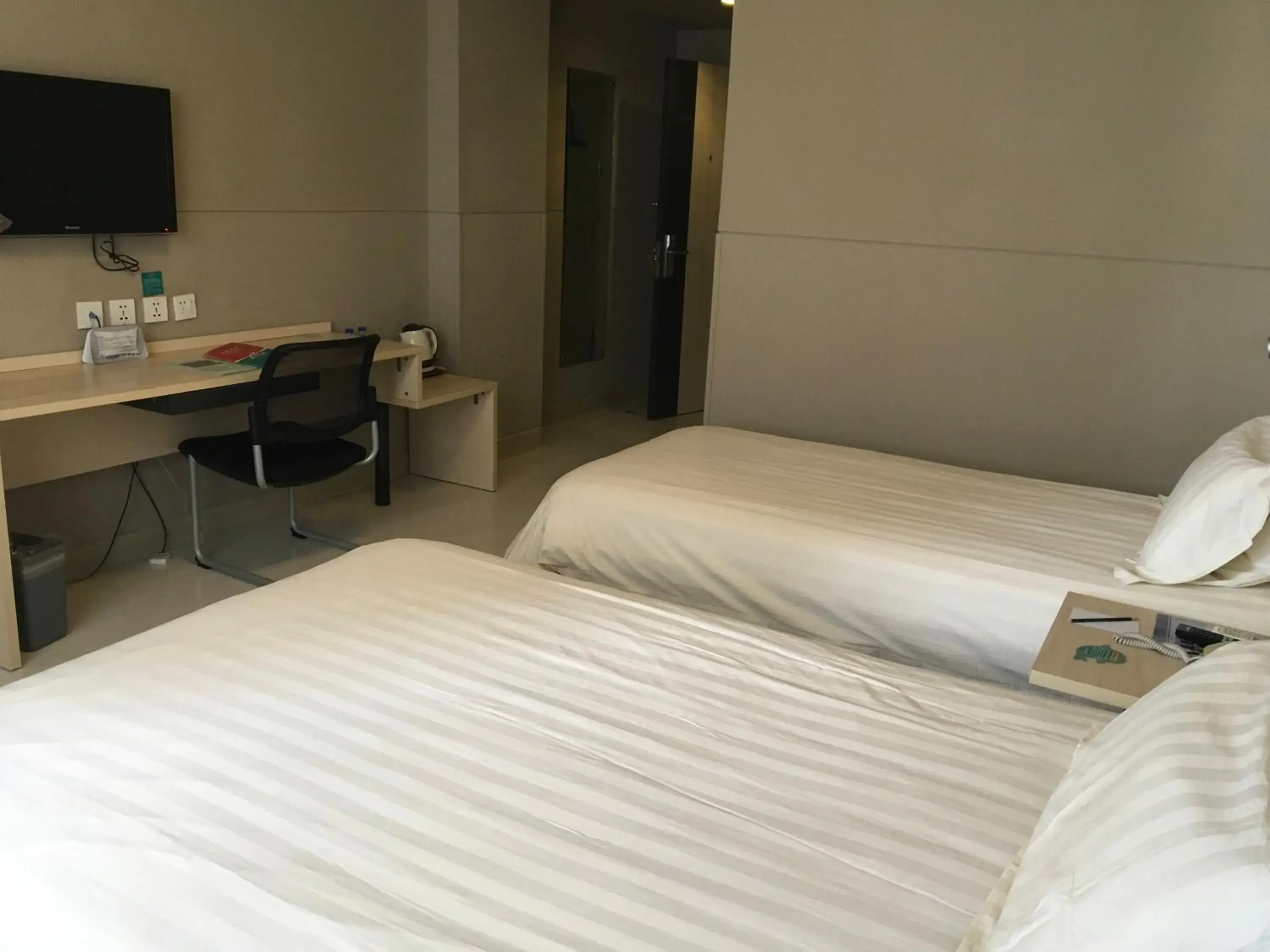 Bed in Jinjiang Inn Lijiang Ancient City Qixing Street Bed in Jinjiang Inn Lijiang Ancient City Qixing Street