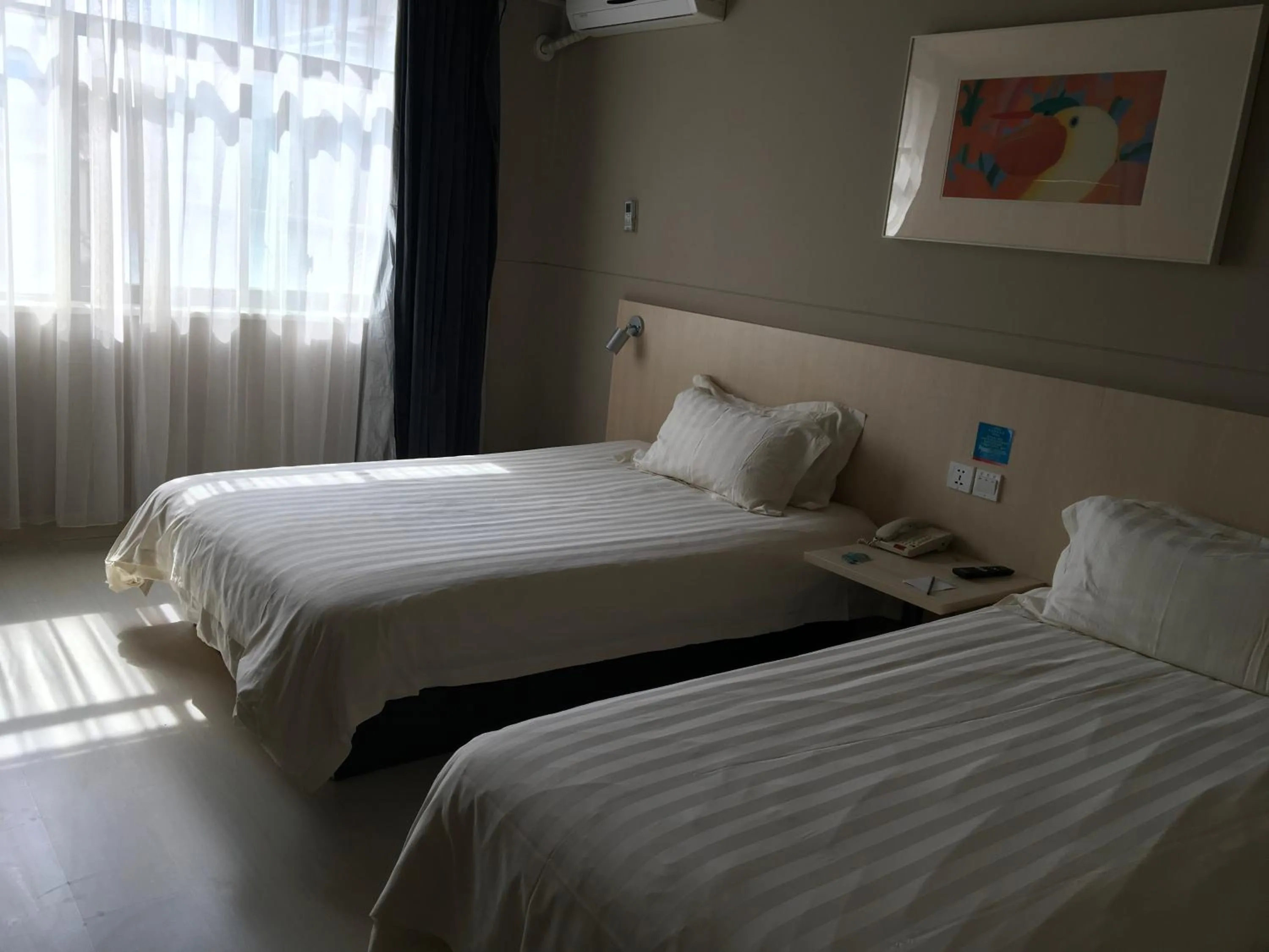 Bed in Jinjiang Inn Lijiang Ancient City Qixing Street